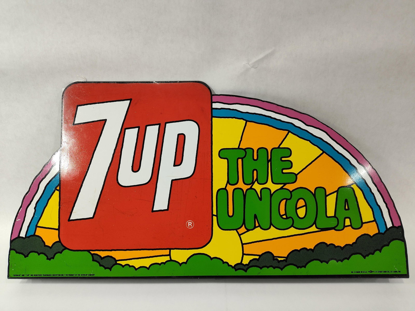 SST 7up The Uncola Peter Max inspired sign: 1-sided painted metal sign with flanged bottom. Shows minor scuffing but overall in great condition!! Marked Stout Sign Co 1-71. 12in X 23.75in.