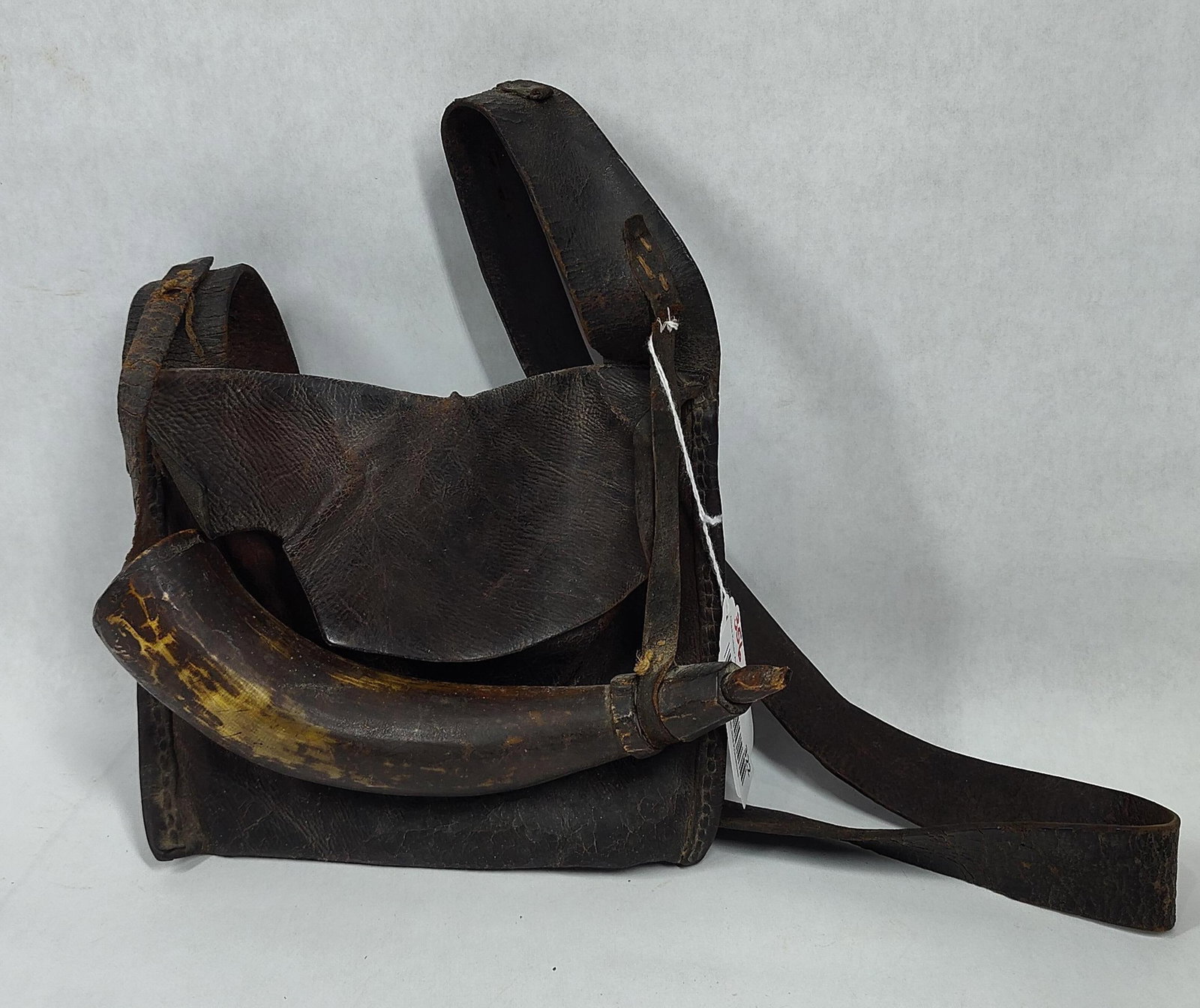Early Leather Hunting Pouch with Powder Horn: Shows some wear. Pouch is approximately 7in x 8in.