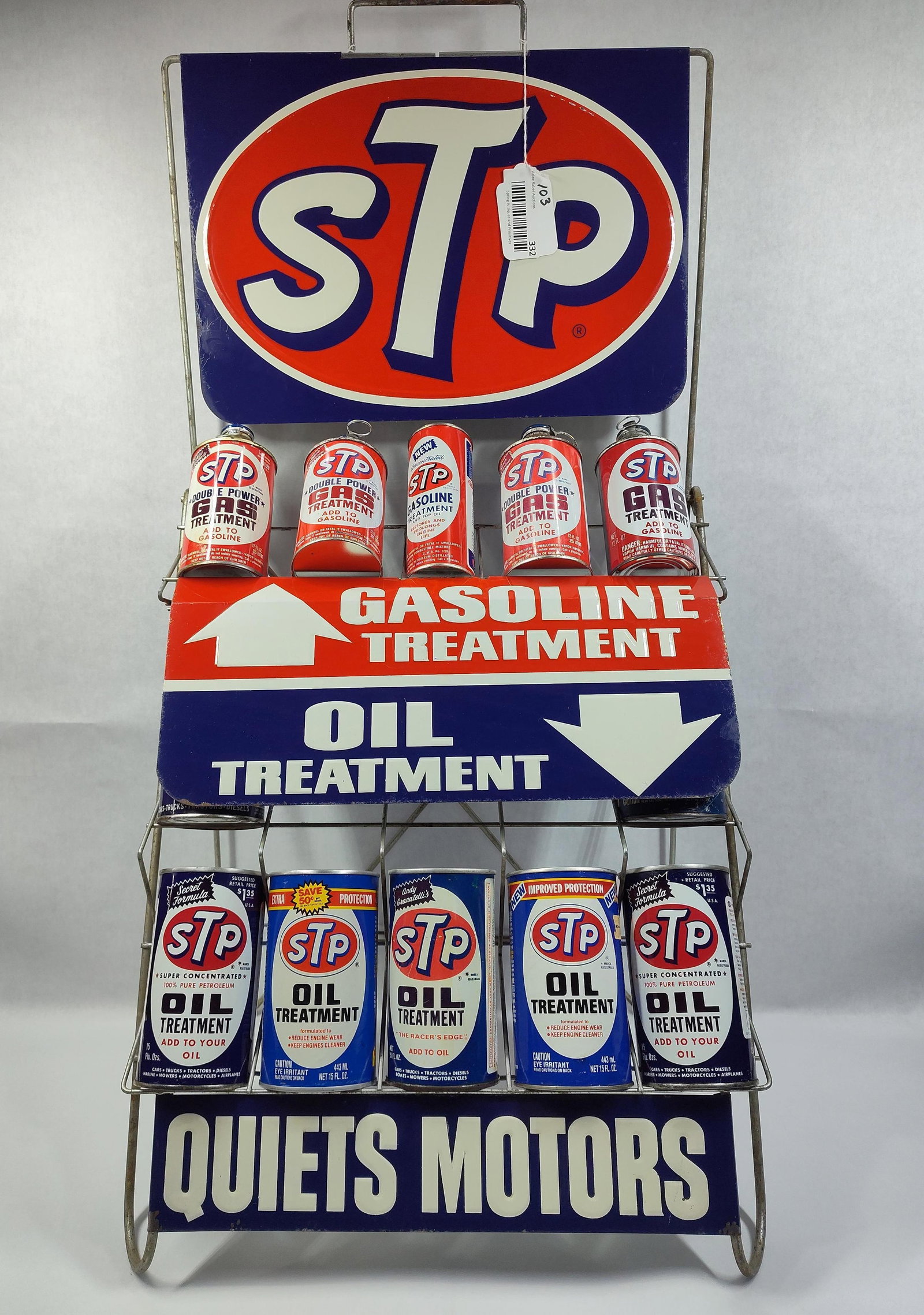 Great STP Gasoline & Oil Treatment Display Rack: Includes 5 gas treatment cans (1 is unopened), 7 oil treatment cans (4 are unopened) 2 are composite. Awesome display!! 17in wide 34in tall.