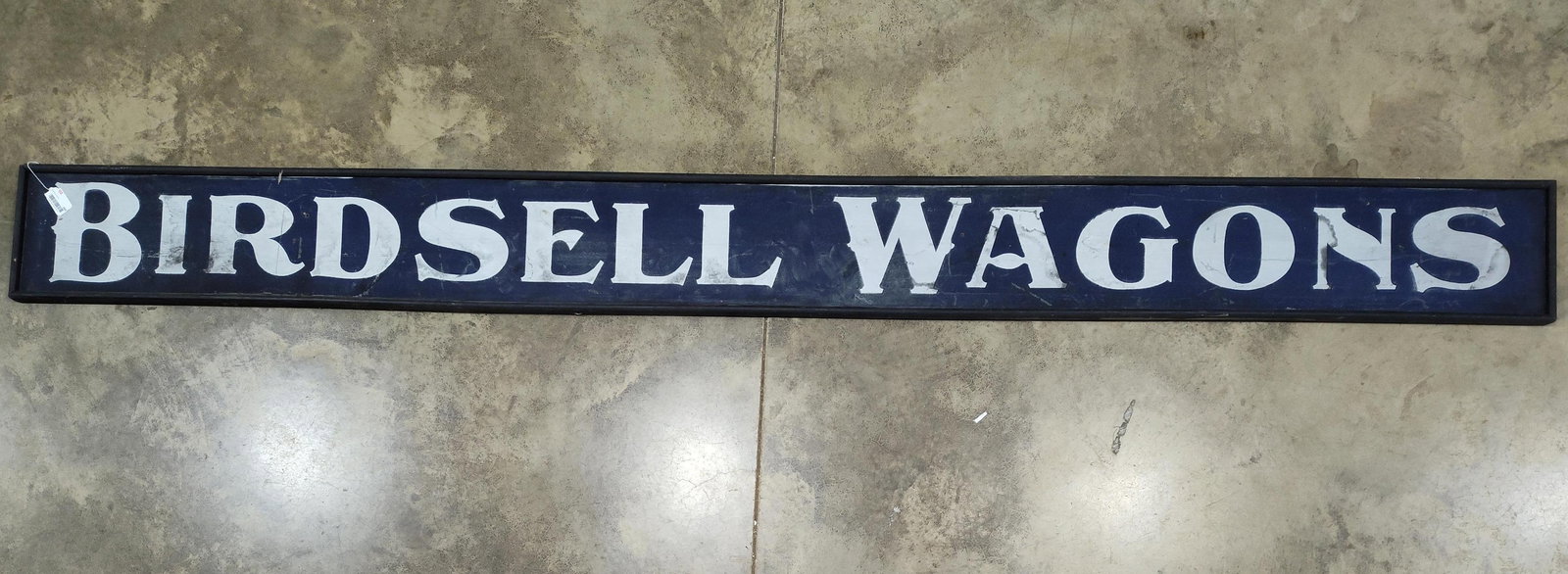 Incredible Birdsell Wagons Wooden Smaltz sign: Outstanding one sided smaltz on wood sign. Believed to be old and original!! Shows areas of scuffing and minor soiling but overall in great condition!! Has a few mounting screws holes in field. 13in