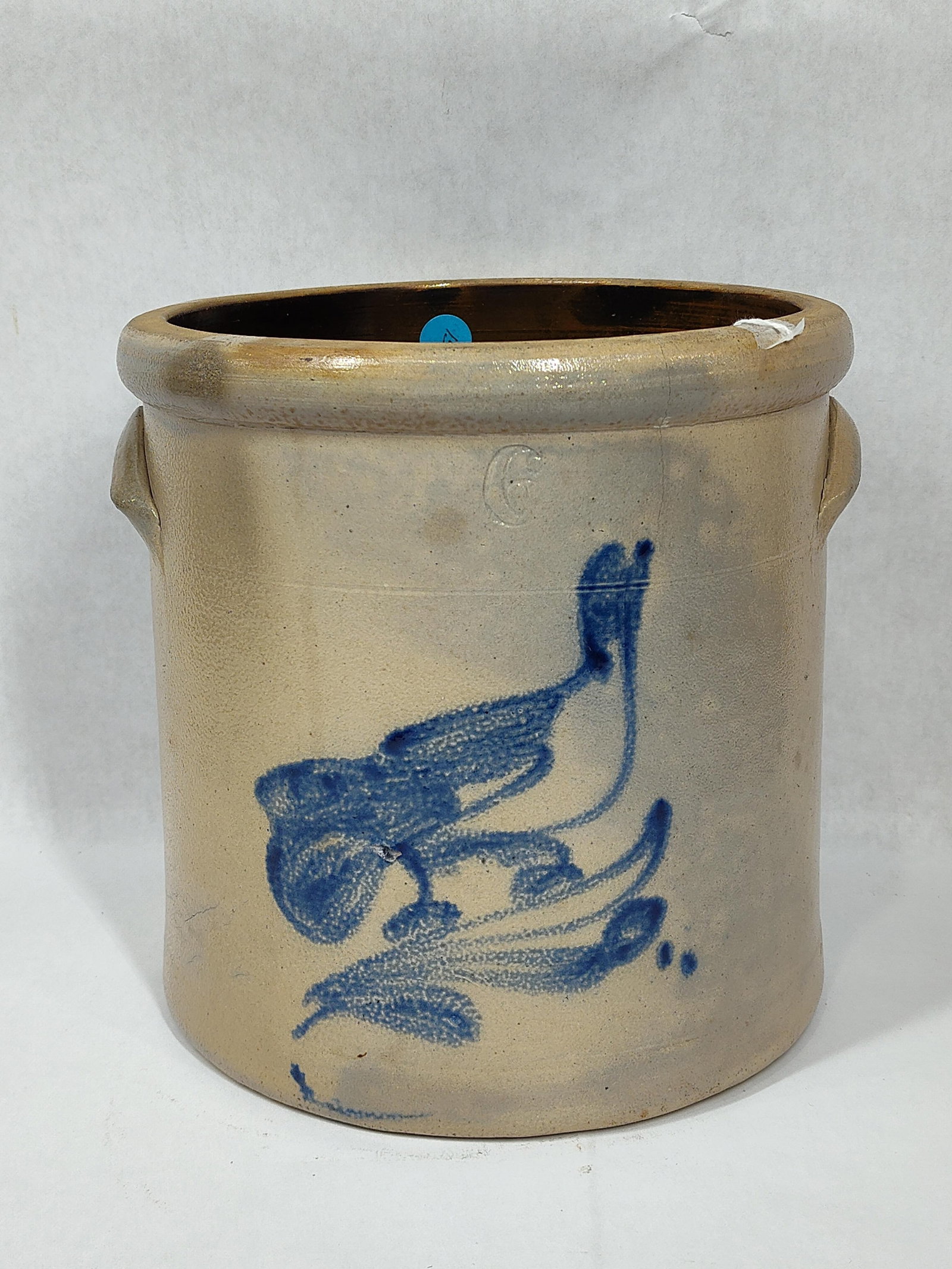 Bird Decorated 6qt stoneware crock: With a flea bite on bird and hairlines on left side towards bottom, they appear may be just on surface and while molding, not visible from interior. 8.5in diameter and tall.