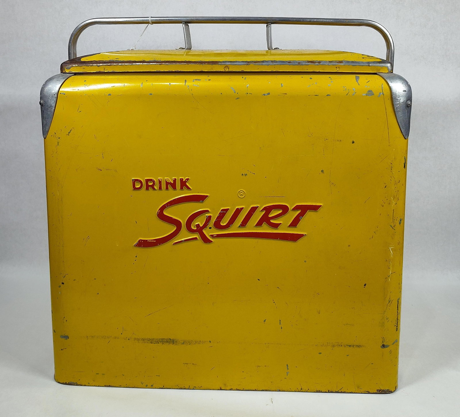 Progress Refrigerator Co Squirt Cooler: Shows some paint wear along edges but overall is nice and straight with interior tray. 17.5in long 12.5in wide 17in tall.