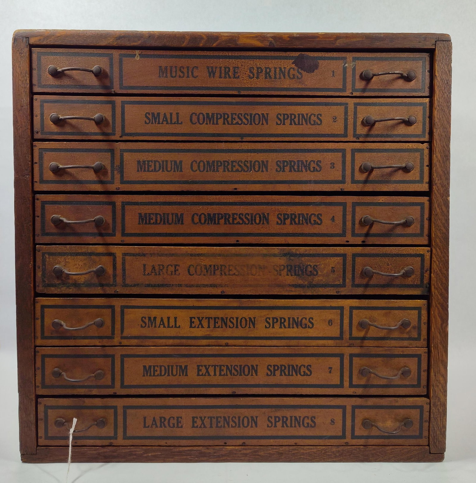 Great Oak Country Store 8drw Springs Storage Cabinet: With vivid graphics on drawer fronts and all original pulls in great clean condition!! With comparted drawers. 19.5in wide 12.5in deep 19.5in tall.