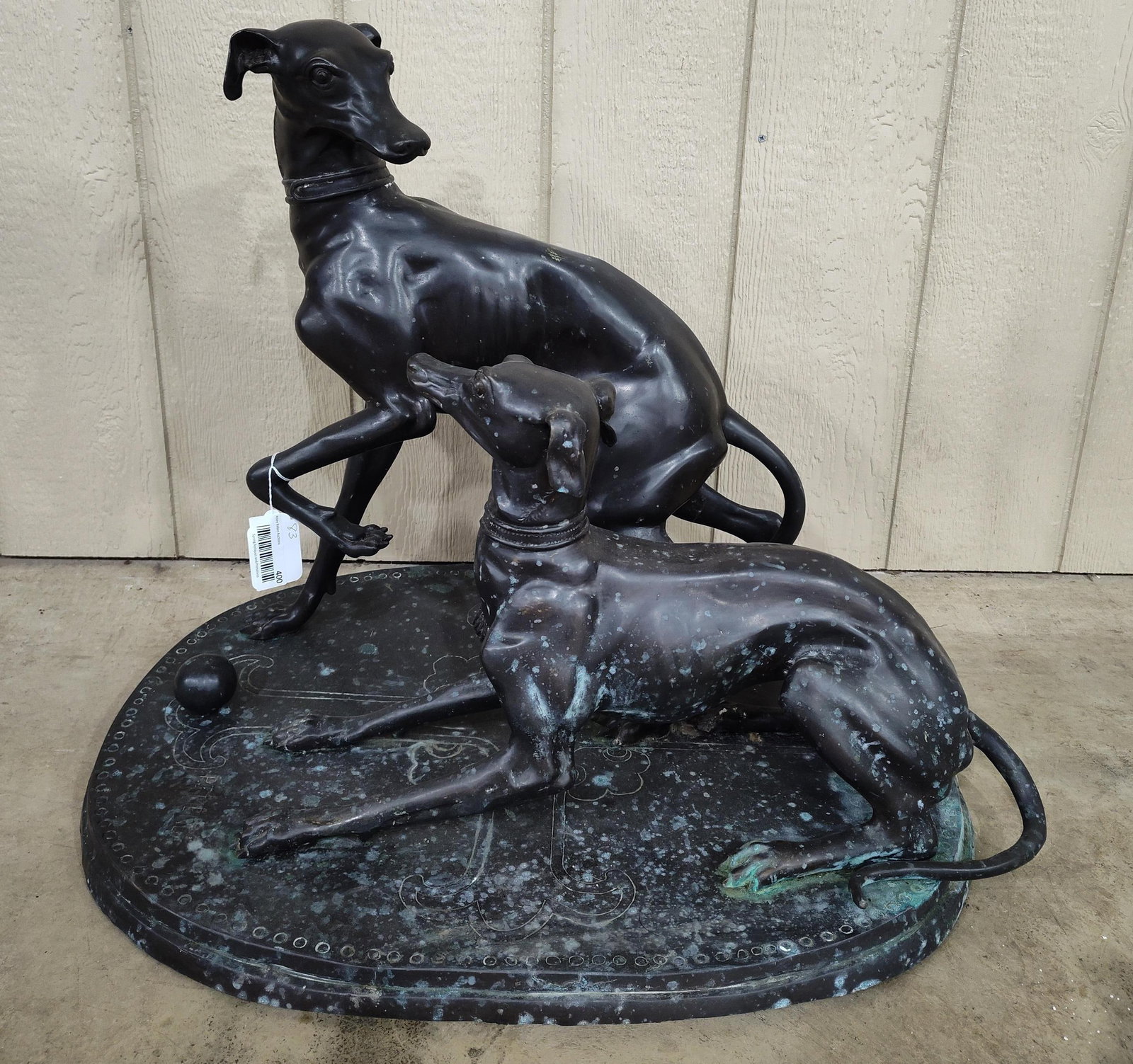 Awesome P.J. Menes French Greyhound Sculpture: Bronze sculpture titled Jiji and Gisella by Pierre-Jules Mene signed on base. With small circles etched surrounding base and etched design on base. Shows a small crack at P.J. Mene signature on base
