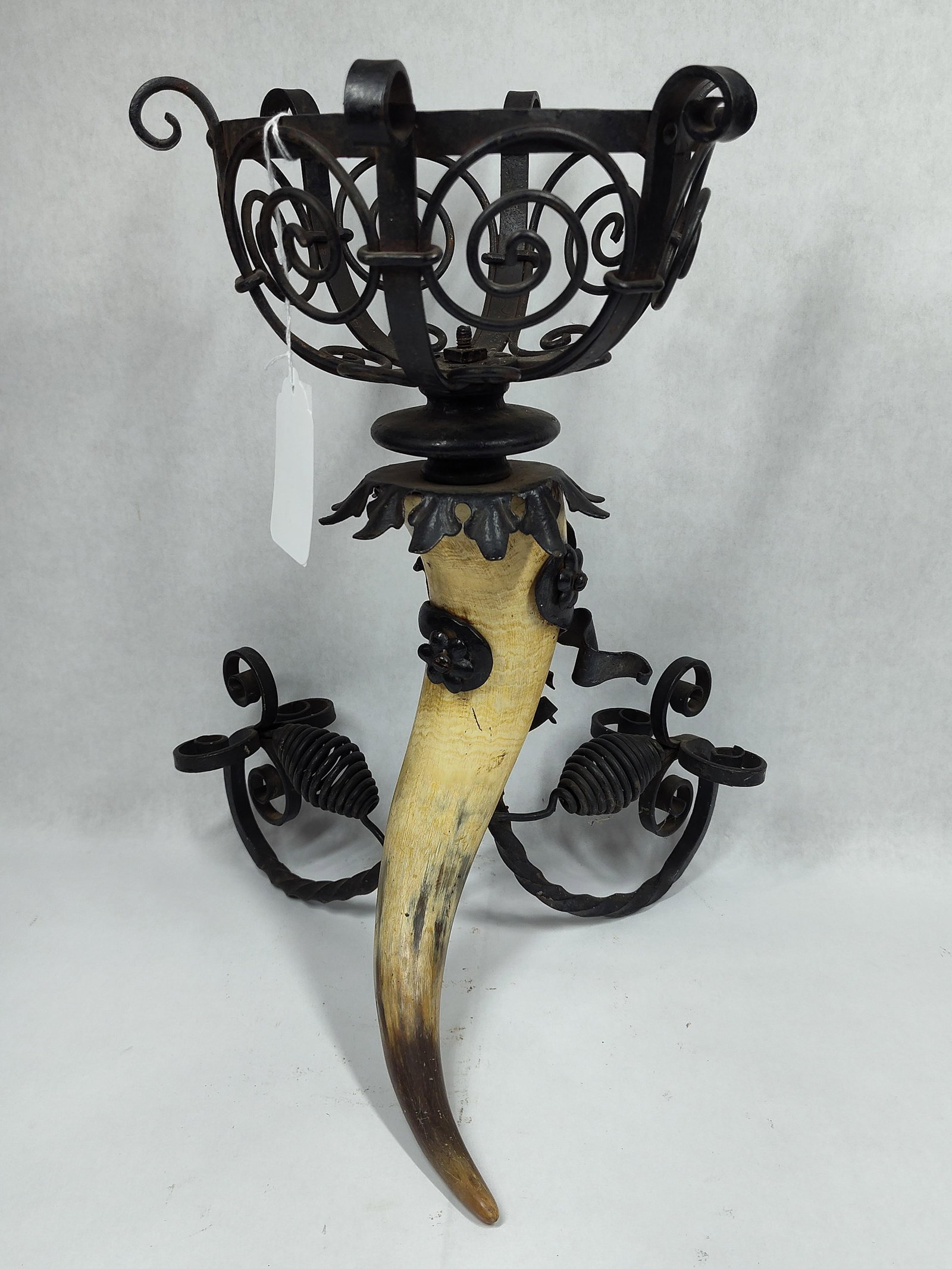Arts & Crafts Gothic wrought iron holder: Rotating top. 16in tall.