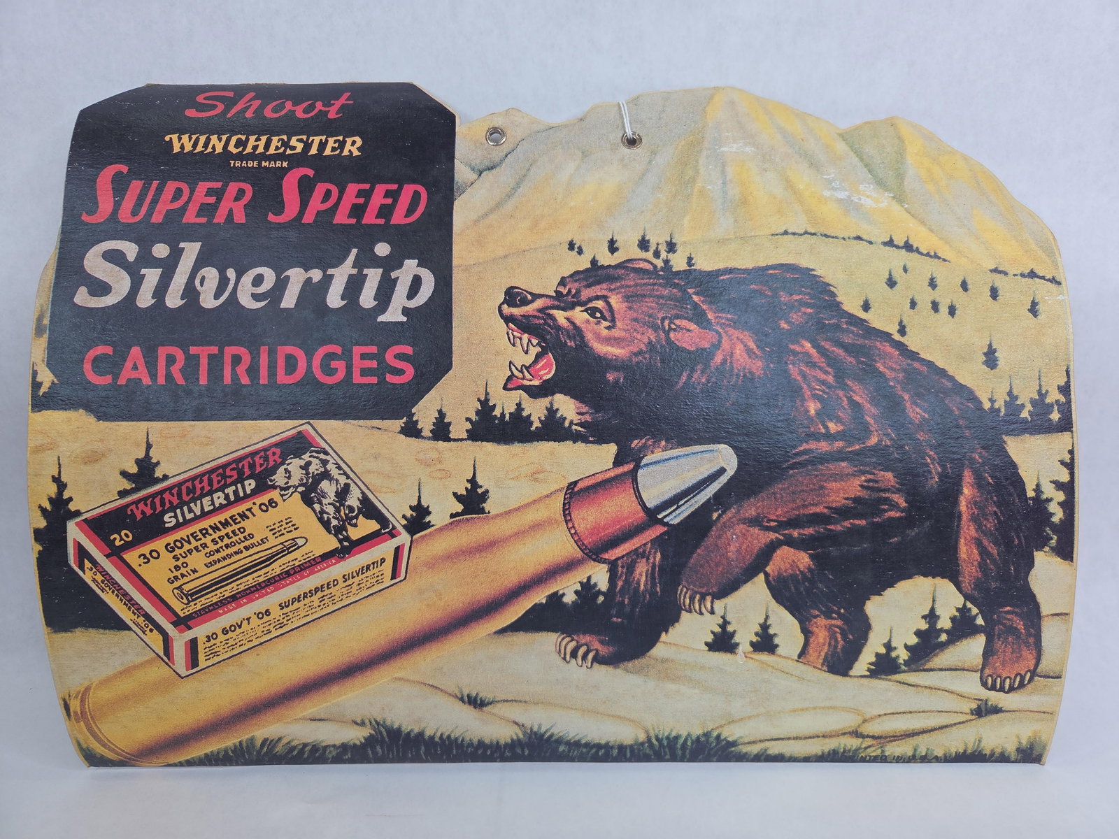 Great graphical cardboard Winchester Cartridge sign: 1-sided cardboard litho with excellent graphics!! Has a slight bow but overall is in good condition! 15in x 11in.
