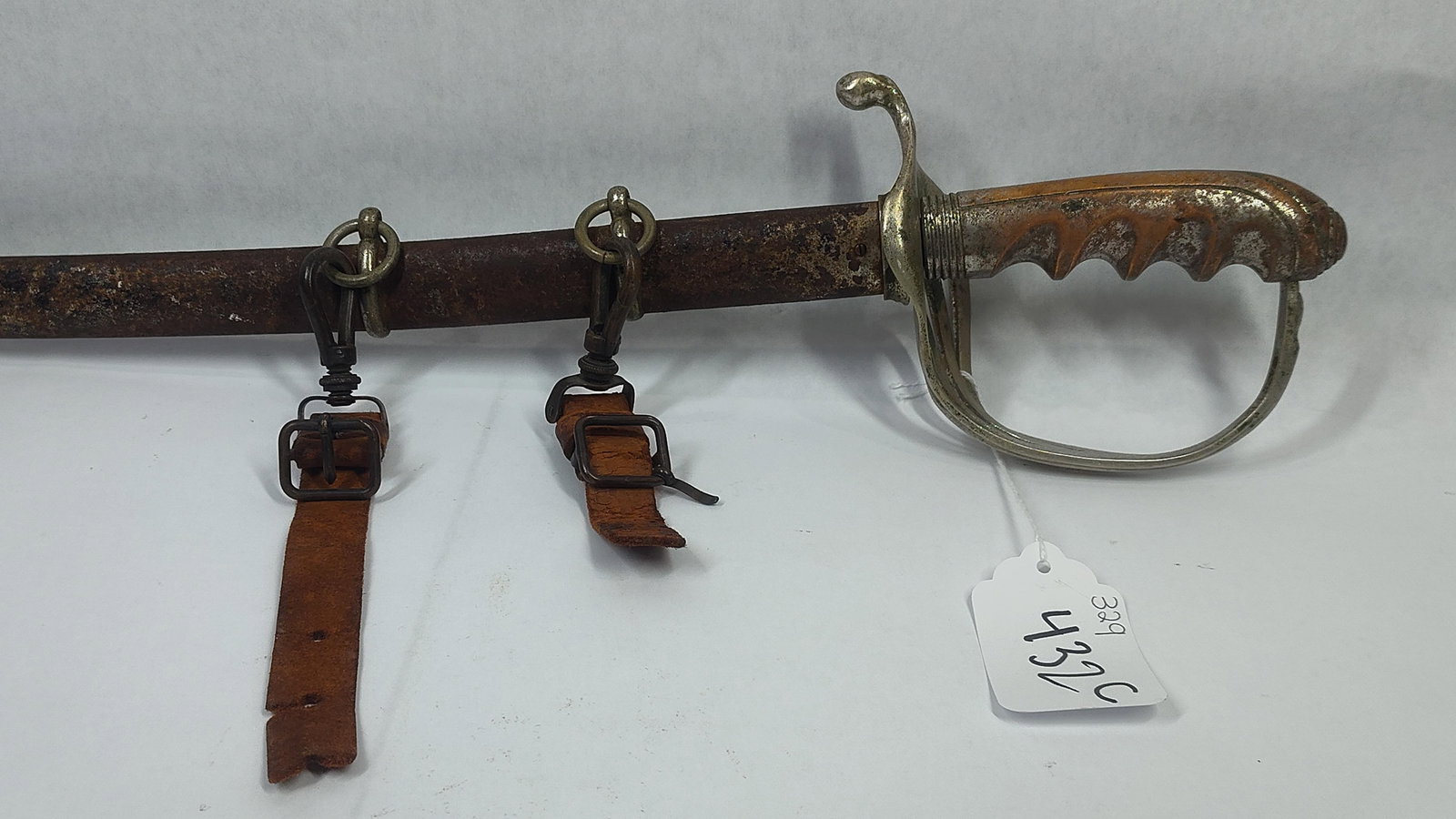 Henderson-Ames Co US Calvary: Side of blade is etched US. Early 20th century, WW1 era or prior. 38 inches long with scabbard and guard handle. 