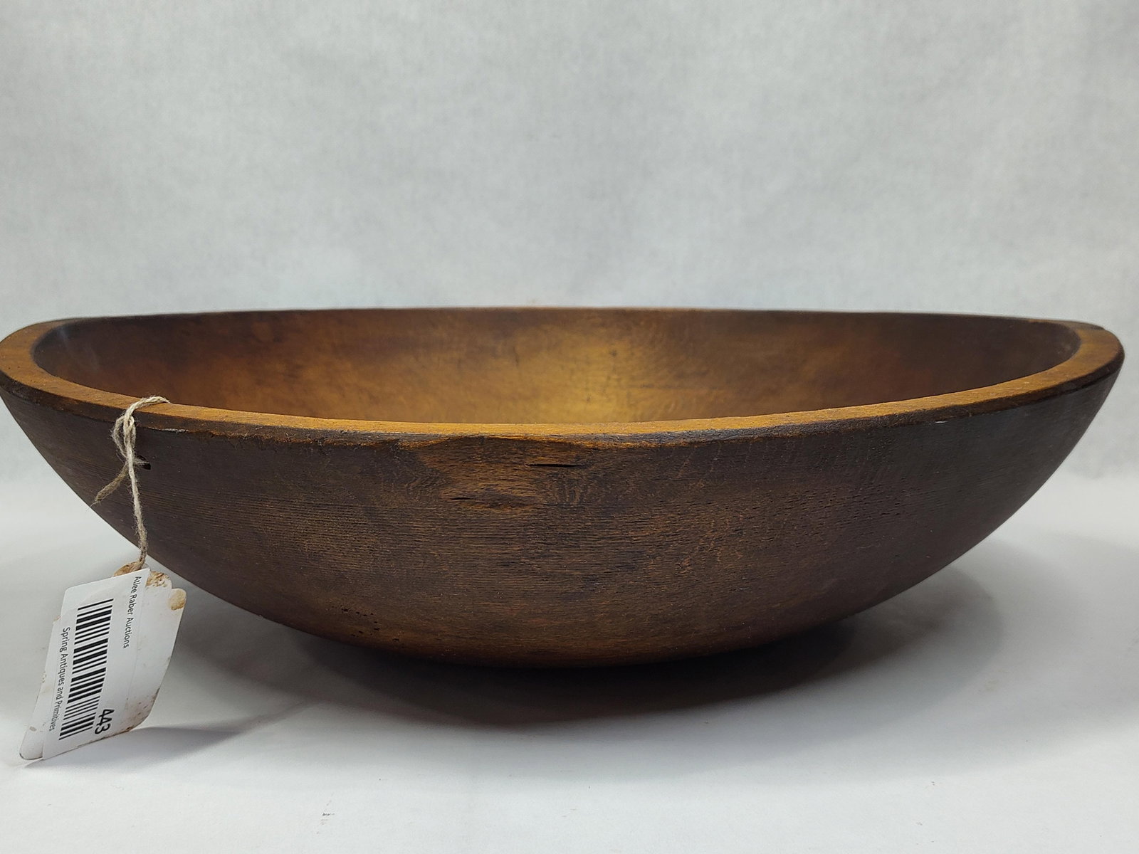 Primitive wooden butter bowl: 16in diameter.