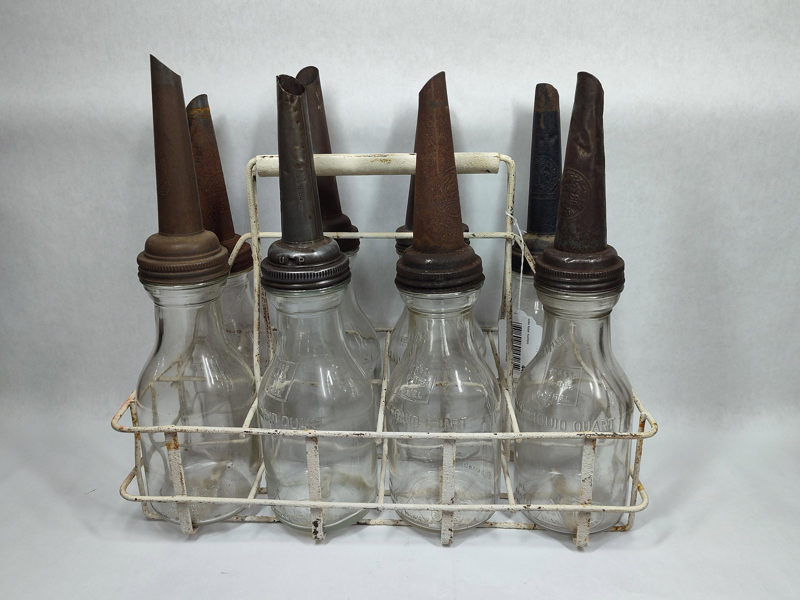 8-Glass Oil Bottles with carrier: 6 are identical.
