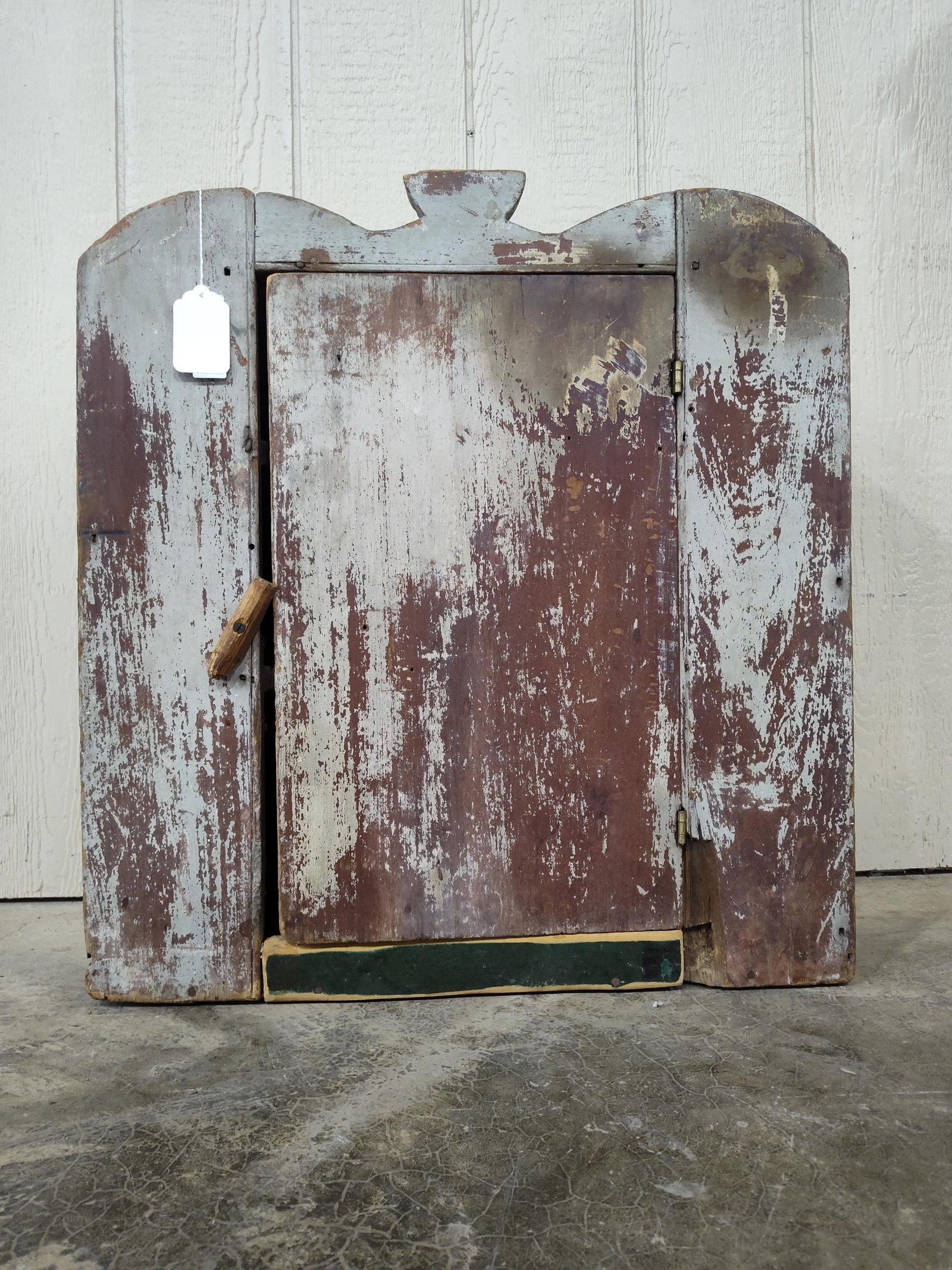 Primitive painted Hanging Cabinet: Trim below door has been replaced and shows a chip just right of it but has a great primitive look!! 25in wide 12in deep 26.5in tall to crown.