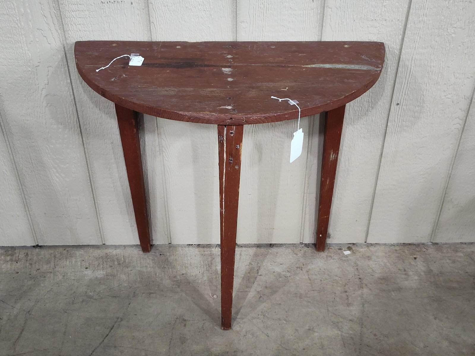 Primitive Red Painted Half Moon Table: Shows a splinter on top. 29in x 13.5in 27in tall. Great red paint!!