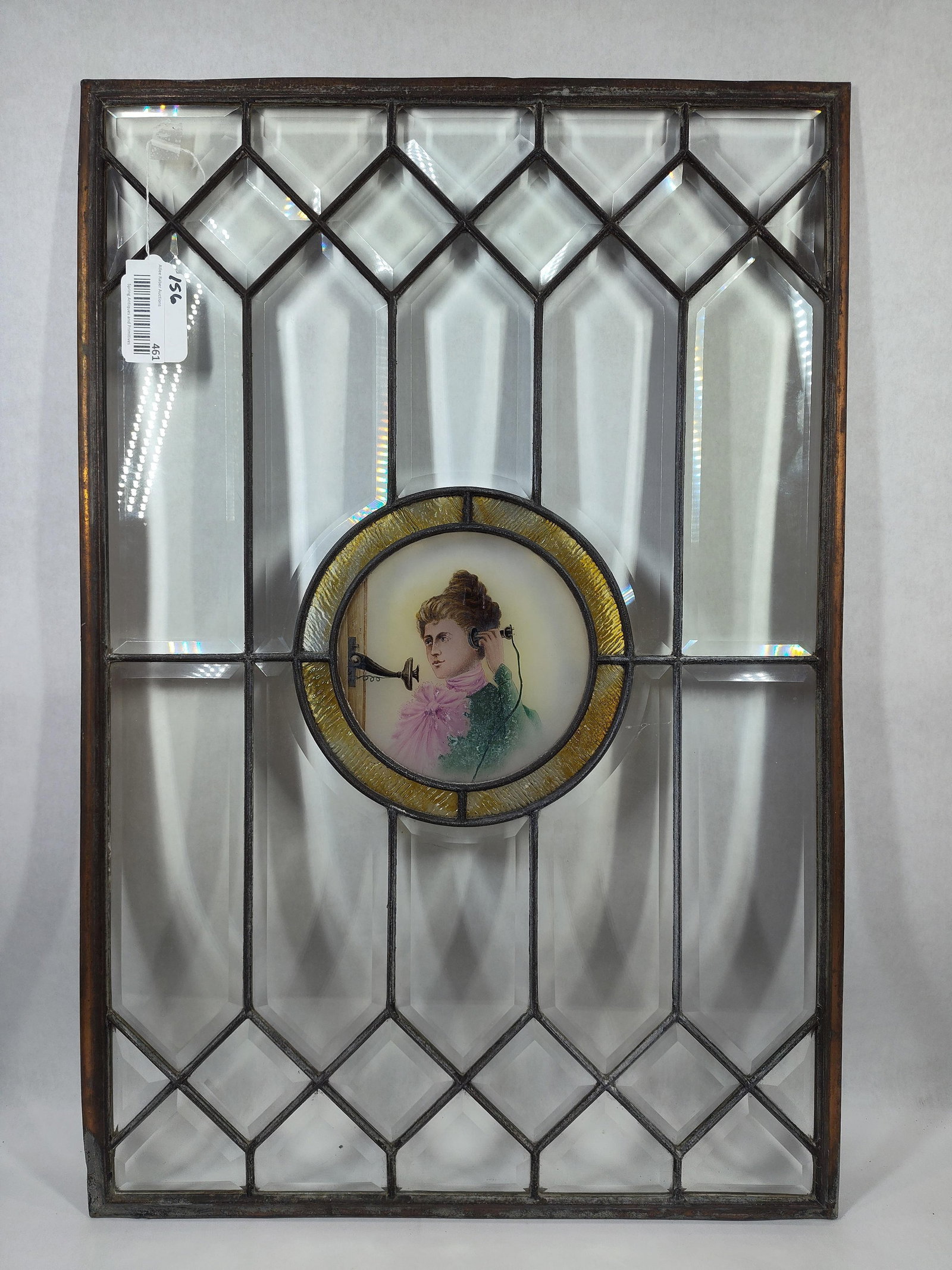Beveled Leaded Glass Window w/ Center Medallion of Madam: Beautiful beveled window center medallion of early madam on wall phone! Great condition!! 20in x 30in.