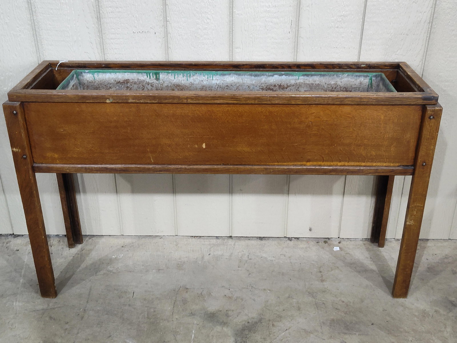 Unusual Quartersawn Oak Planter Box: Comes with a metal liner that is smaller than interior. 45in long 12in wide 27in tall.