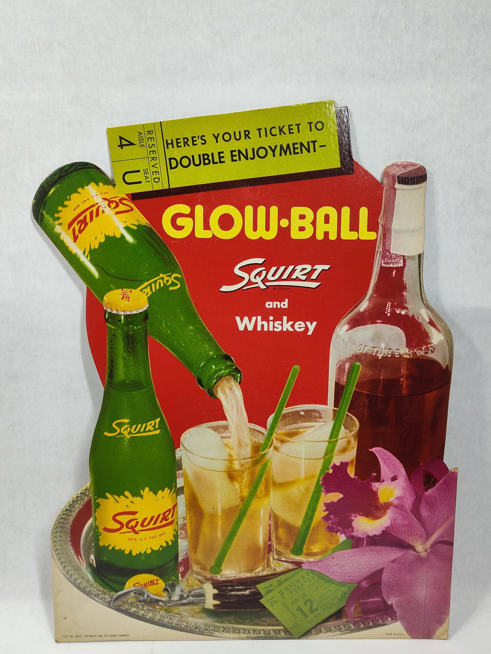 1952 Squirt and Whiskey Glow-Ball cdbd easelback sign: Great colorful die cut cardboard litho with easelback!! Shows minor wear at corners overall in excellent condition! 14.25in x 18.75in.