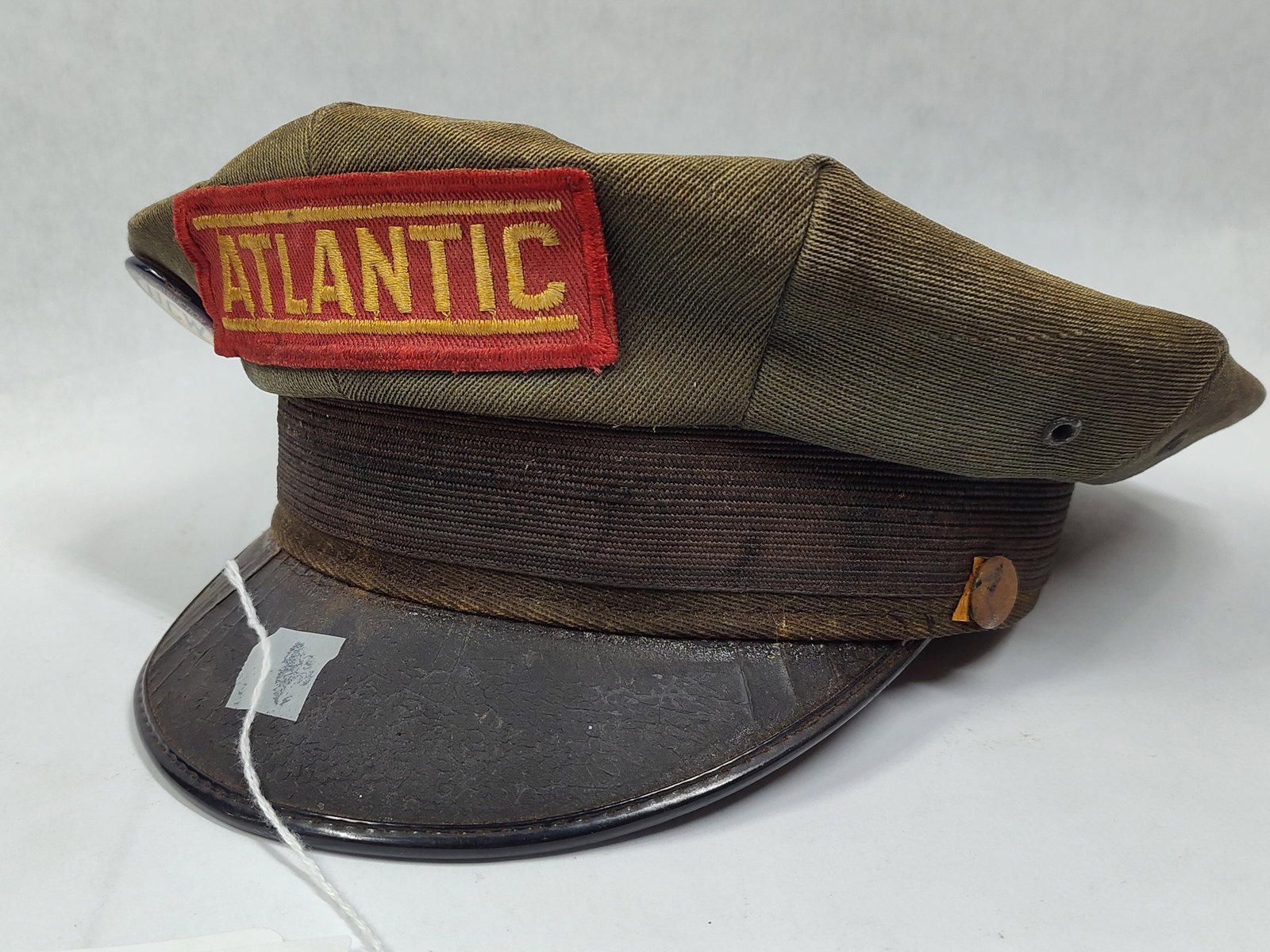 Atlantic Service Station hat: In its original state, shows some wear to interior head band but displays great!!