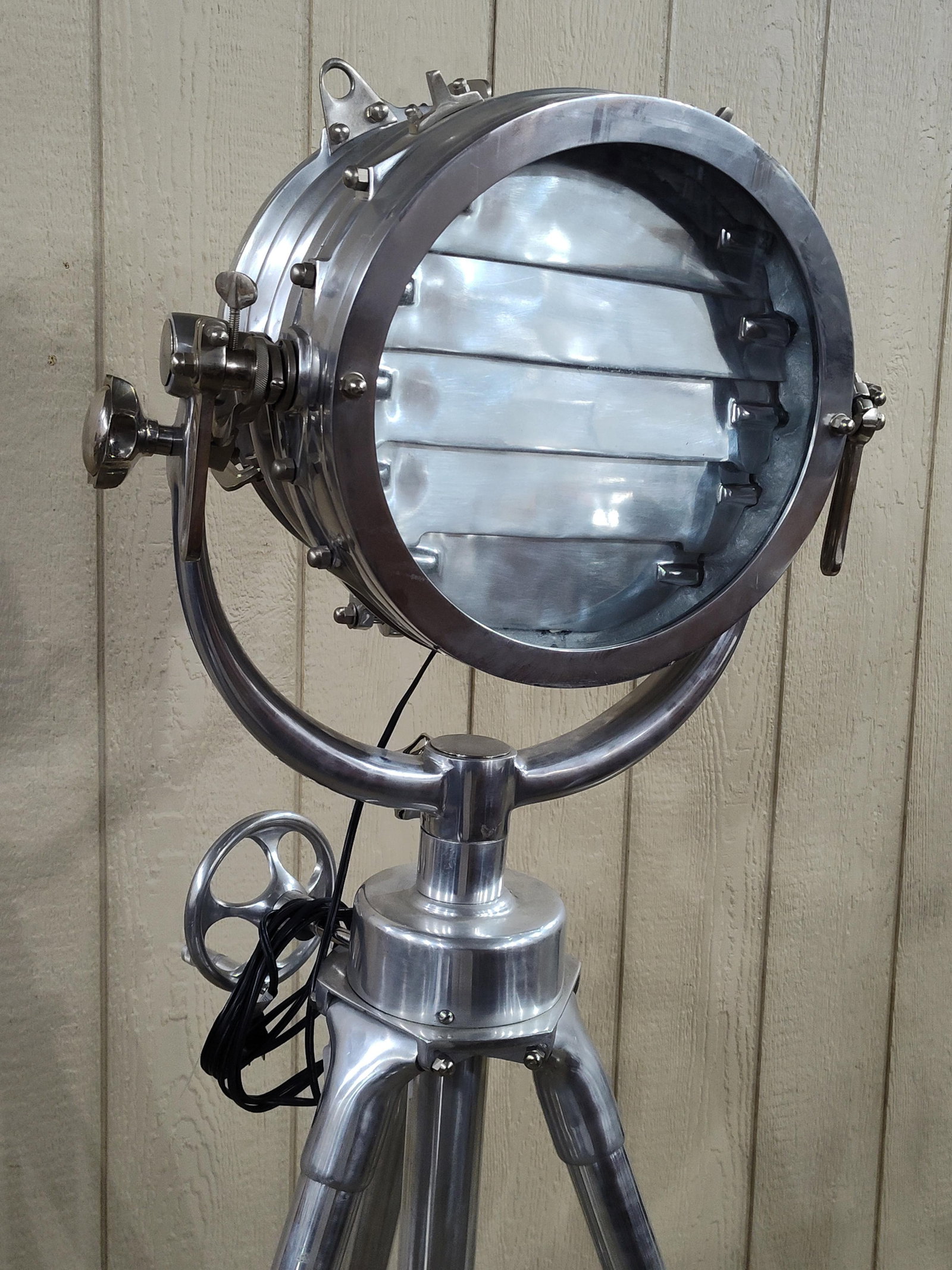 Nautical Royal Master Adjustable Sea Light: Impressive looking stainless or nickel finish beacon/spot light! Tripod and light head are adjustable. Is in great clean condition but does not light. Light head is 13.5in diameter 60in tall at