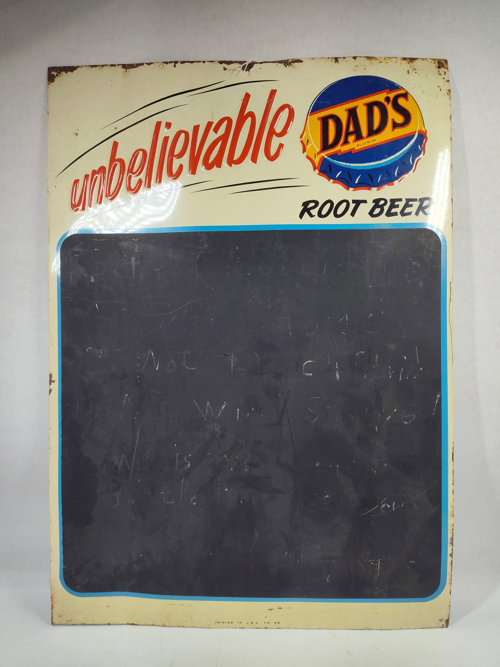 SST Dad's Root Beer Menu sign: 1-sided painted tin sign with rolled over edges and shows some edge wear. 19.5in x 27.5in.