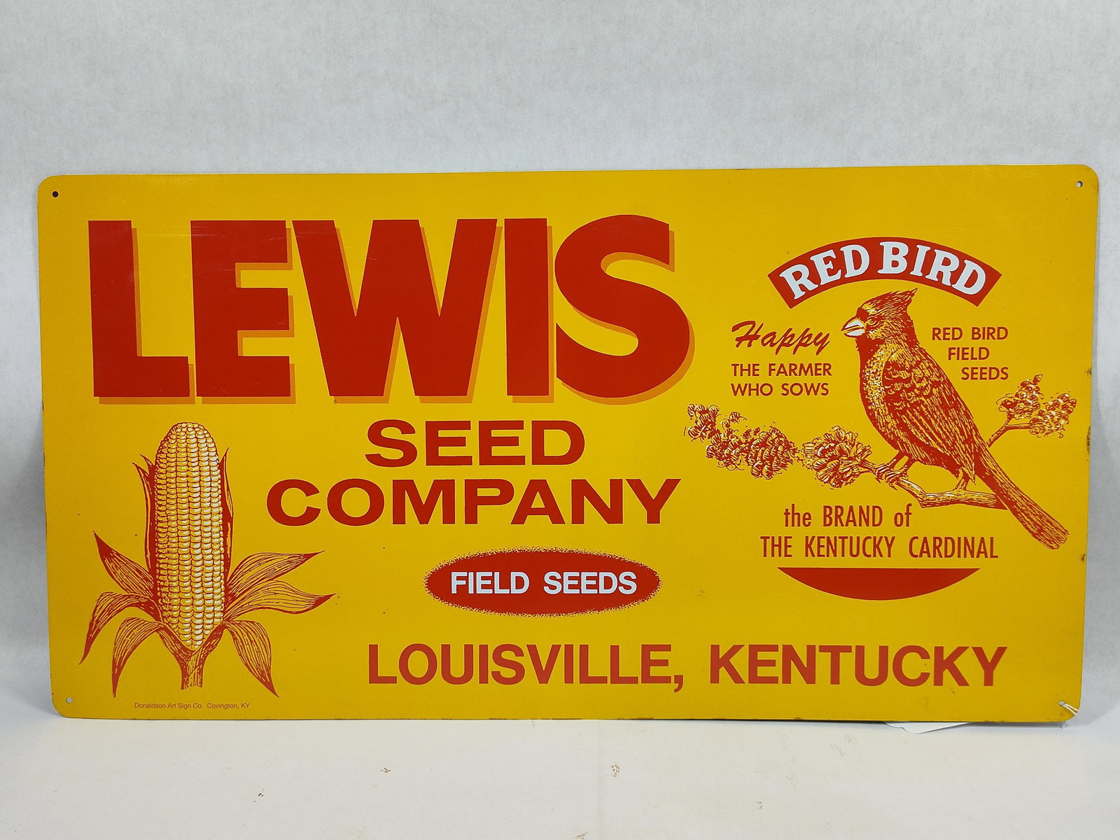 SST Lewis Seed Company sign: 1-sided painted tin sign in new old stock condition! Marked Donaldson Art Sign Co. 11.5in x 21.5in.