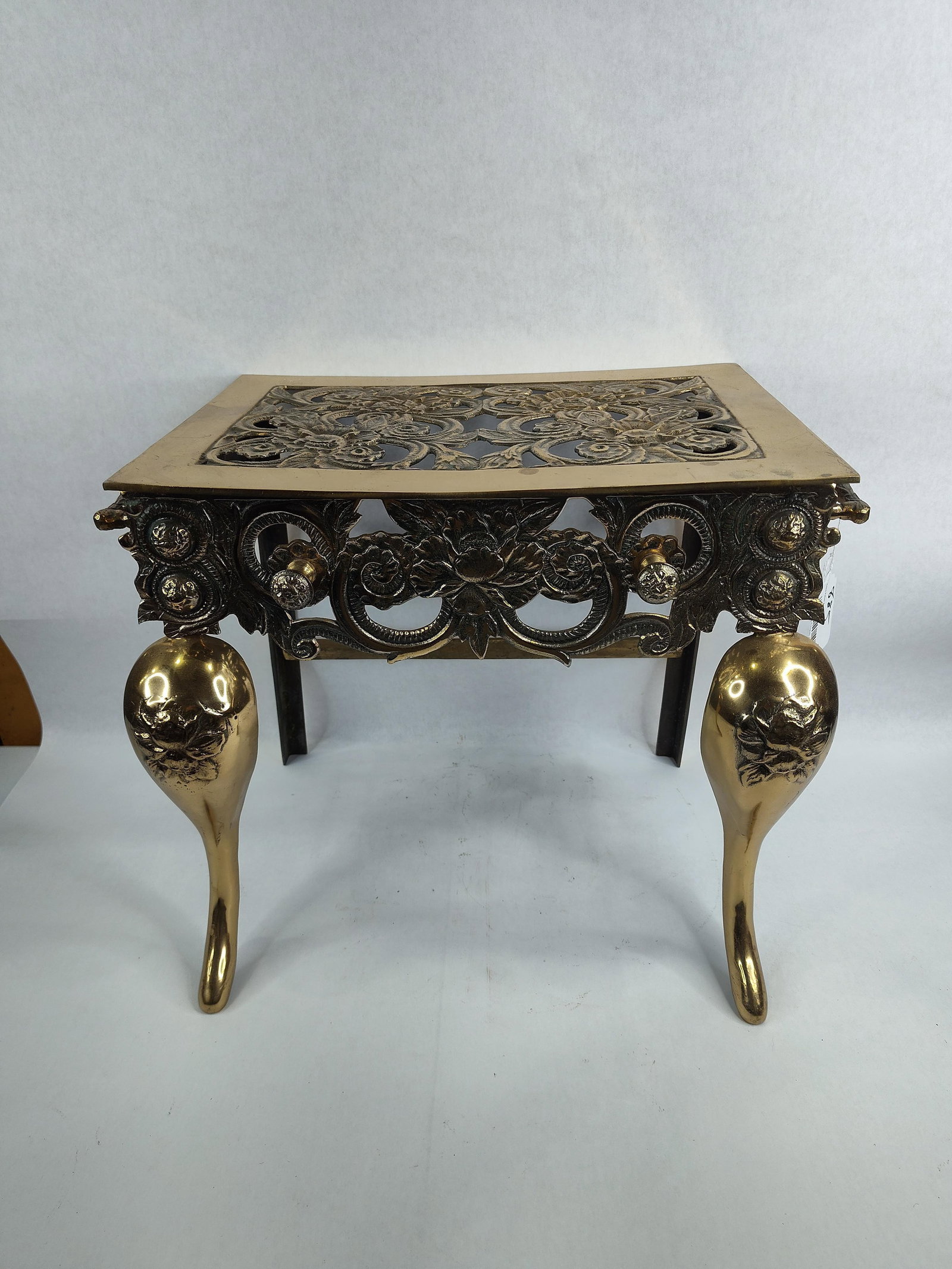 Victorian Brass/Metal Fireplace Footman: Nice ornate fireplace footman with carrying handles on each side. These were used in the 18th and 19th centuries to keep dishes warm near the fire.?Top is 15.5in x 11in 14.5in tall.