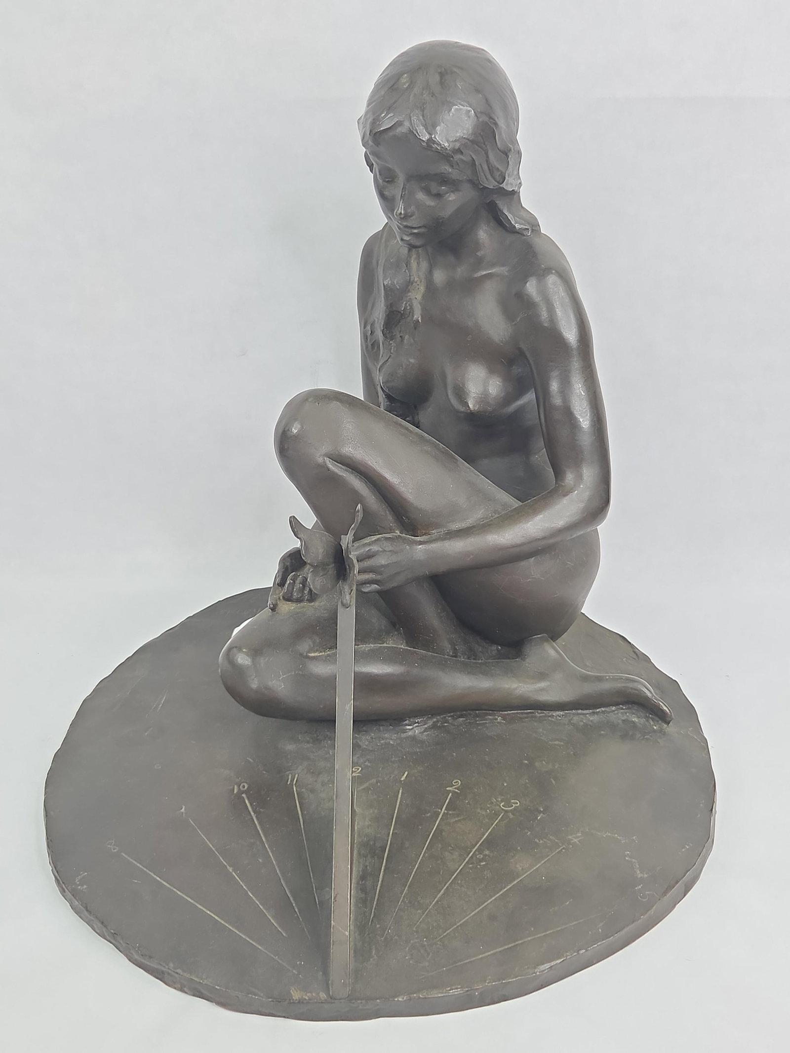 1917 Lucy Currier Richards Bronze Figural Sundial: Great Bronze female nude signed Lucy Currier Richards and dated 1917. Marked on edge Roman Bronze Works NY. 14.5in diameter and tall.