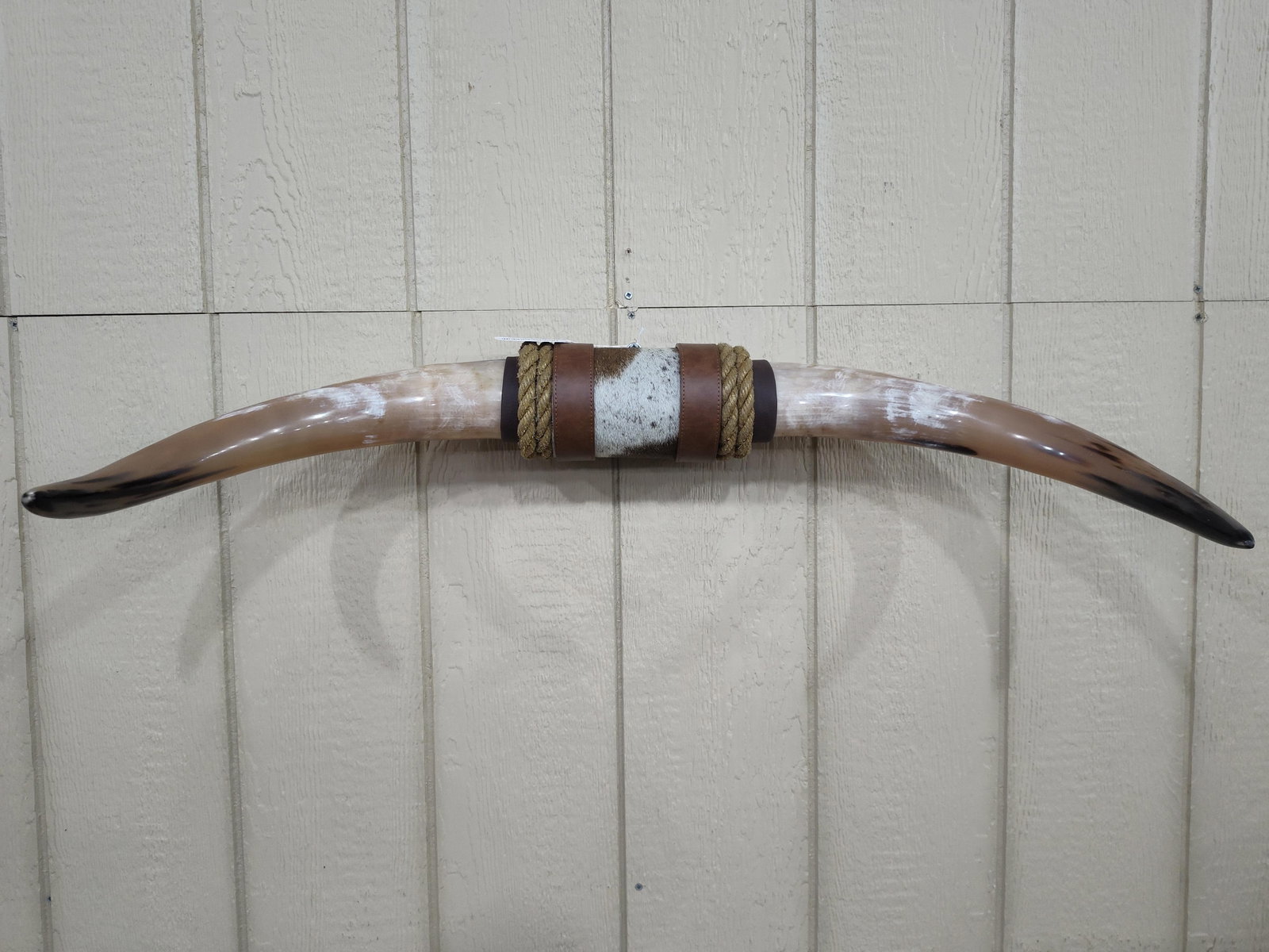 Great set of Bull Horns: Finely designed with authentic Cowhide wrapped with leather & barn rope. 32in wide. Excellent condition!!