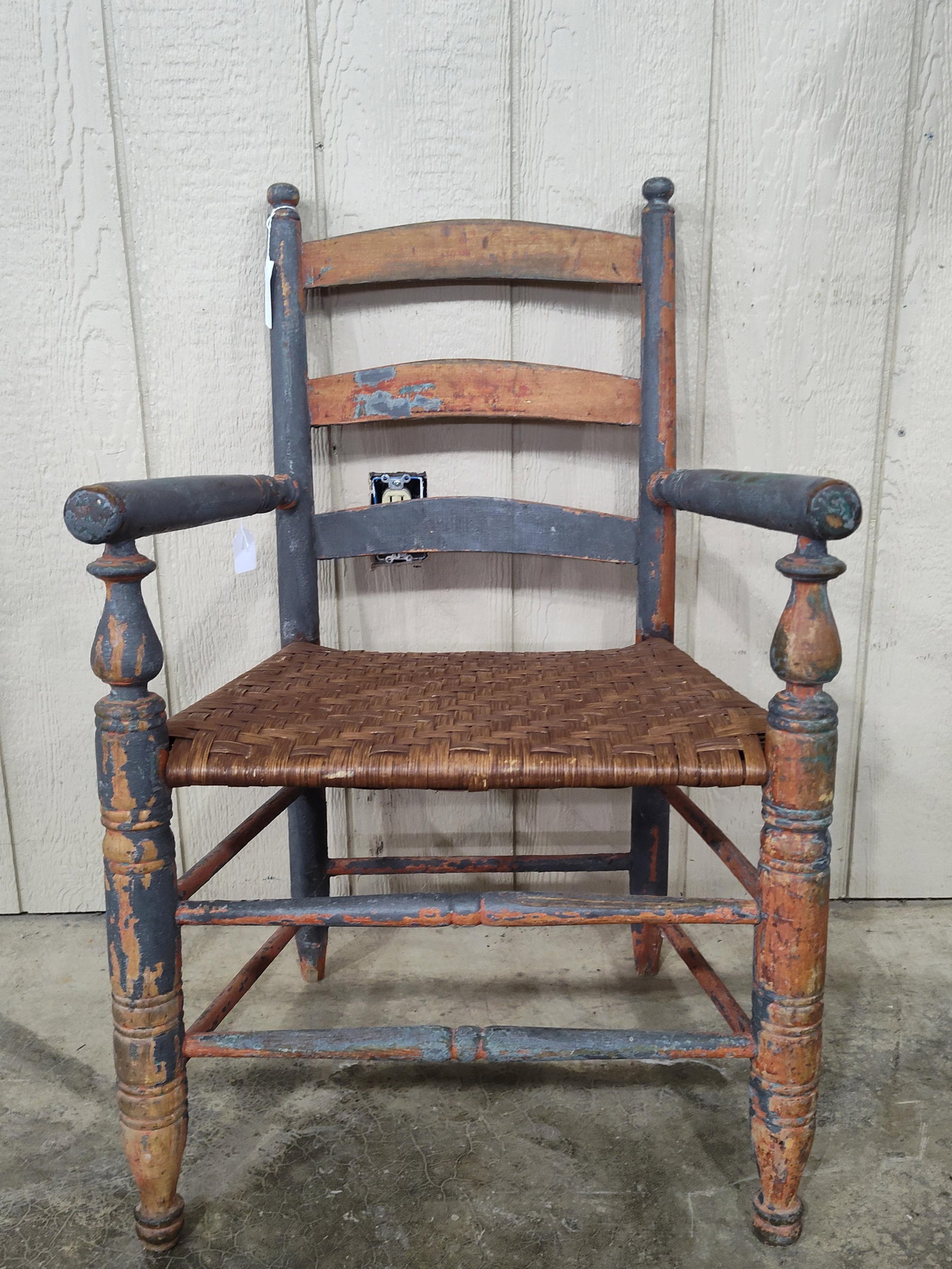 Awesome Early Painted Ladderback Arm Chair: Early original gray over red paint, areas where gray was removed shows red. In good solid condition!! 17in seat height overall is 34in.