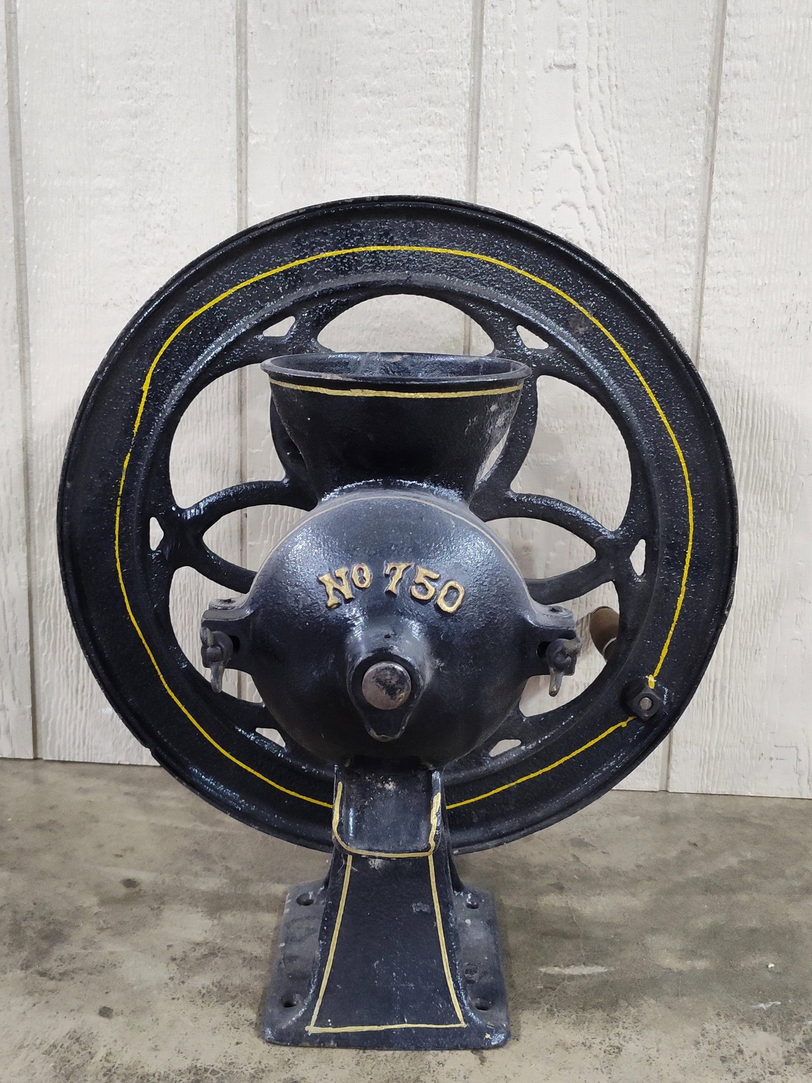 Enterprise No.750 Coffee/Gristmill Grinder: Heavy early cast iron grinder that has been repainted at some point and has an added collar surrounding wheel. Wheel is 19.5in diameter.