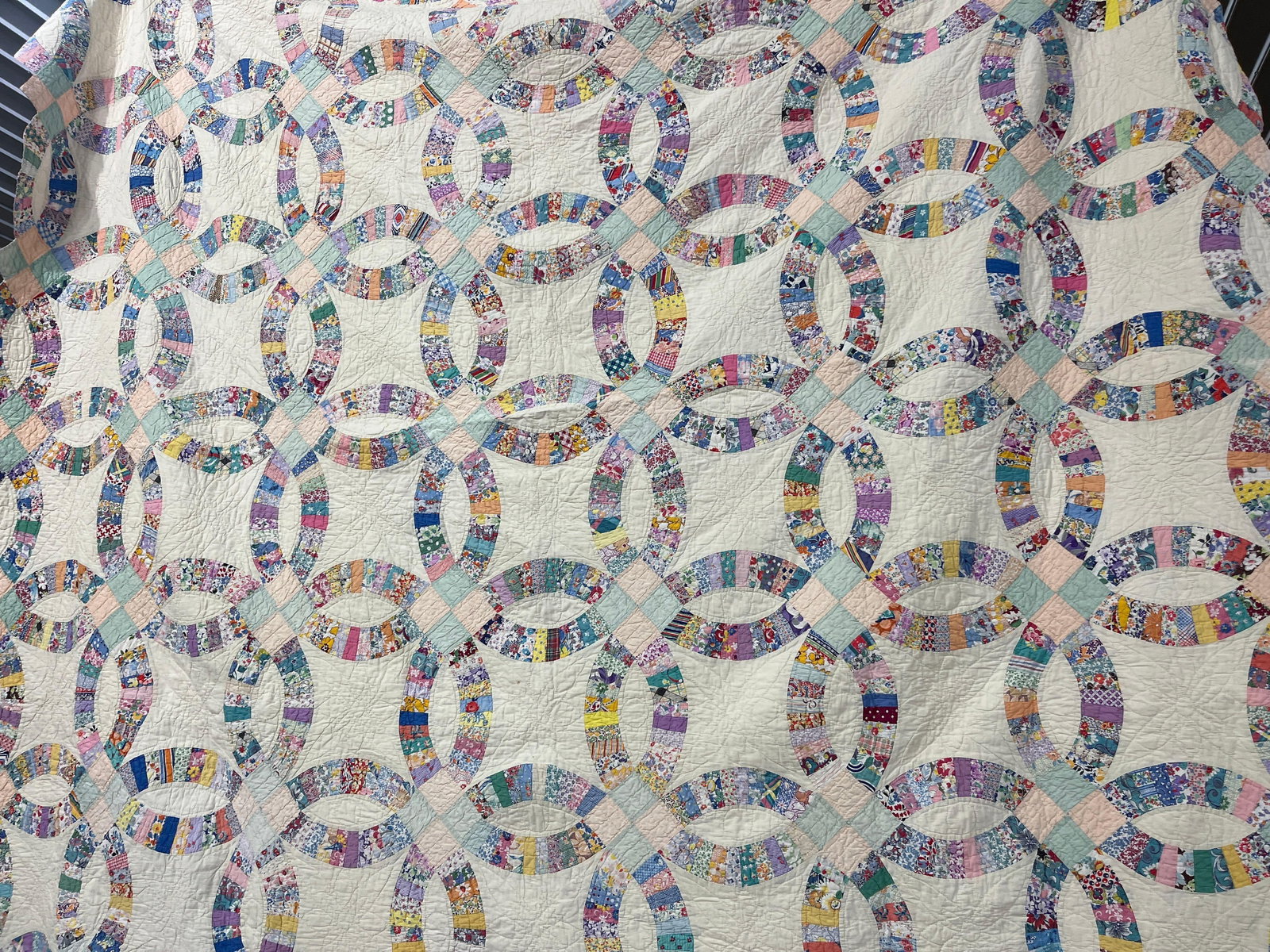 Early Double Wedding Ring Hand Stitched Quilt: Ca 1888, minor staining. 96x86