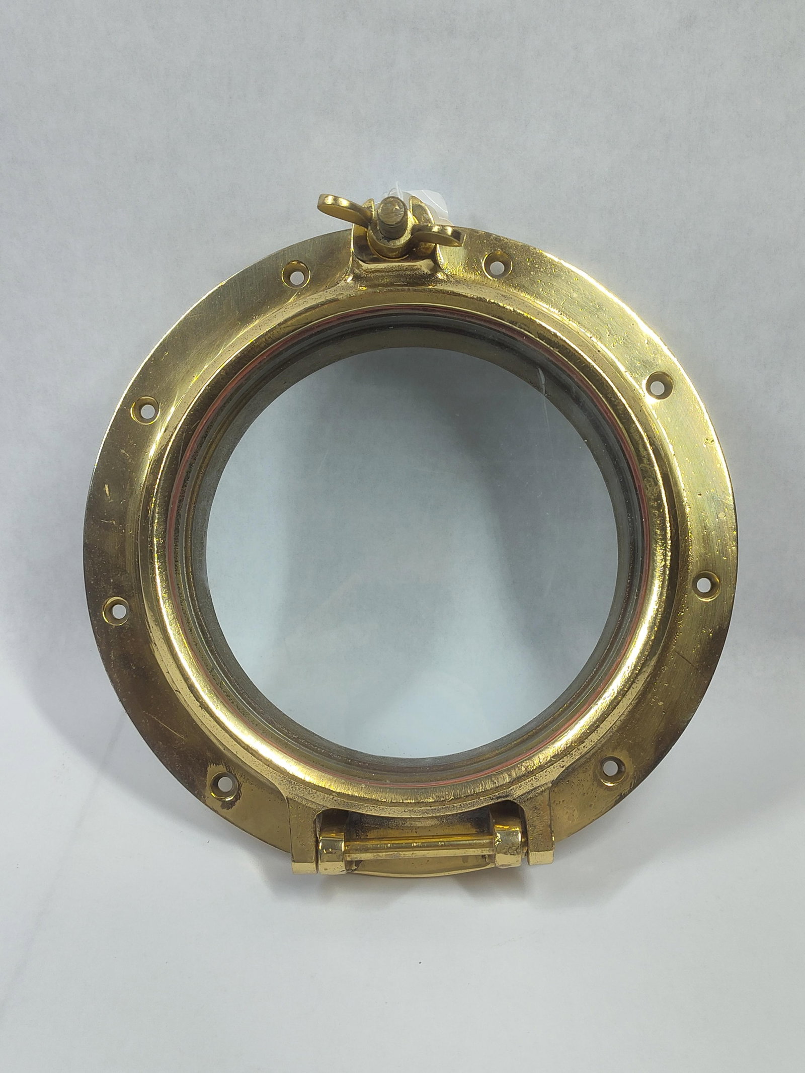 VTG Brass Wilcox Crittenden (WC) Nautical Porthole Window: Great early condition measuring 10.25 in. Diameter 