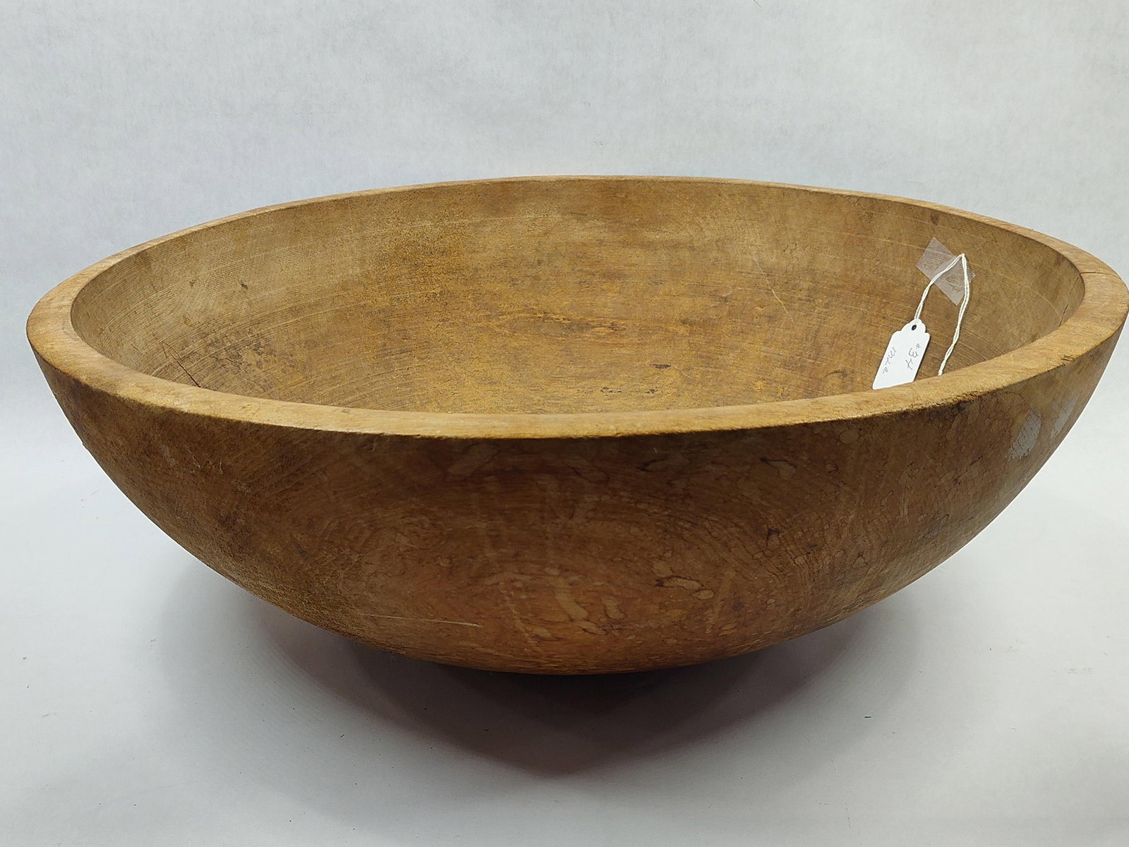 Large Primitive Wooden Bowl: Shows a few cracks but not major. 19in diameter.