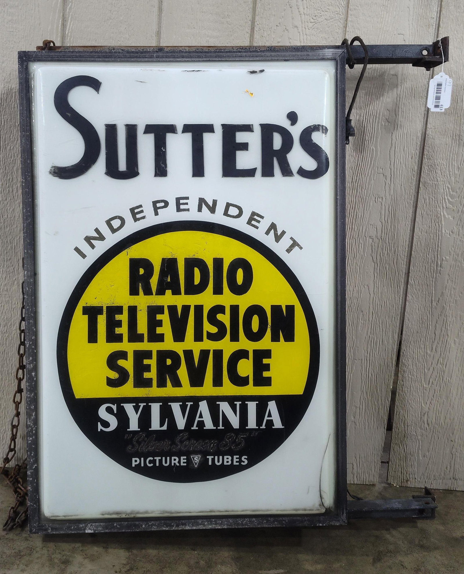 Sutter's Radio Television Service Lighted Sign: 2-sided plastic sign with aluminum frame and metal hanging brackets. Sutter' is hand painted. Sign lit up upon first plugging in but shorted out. With original cloth wrapped cord, plug needs