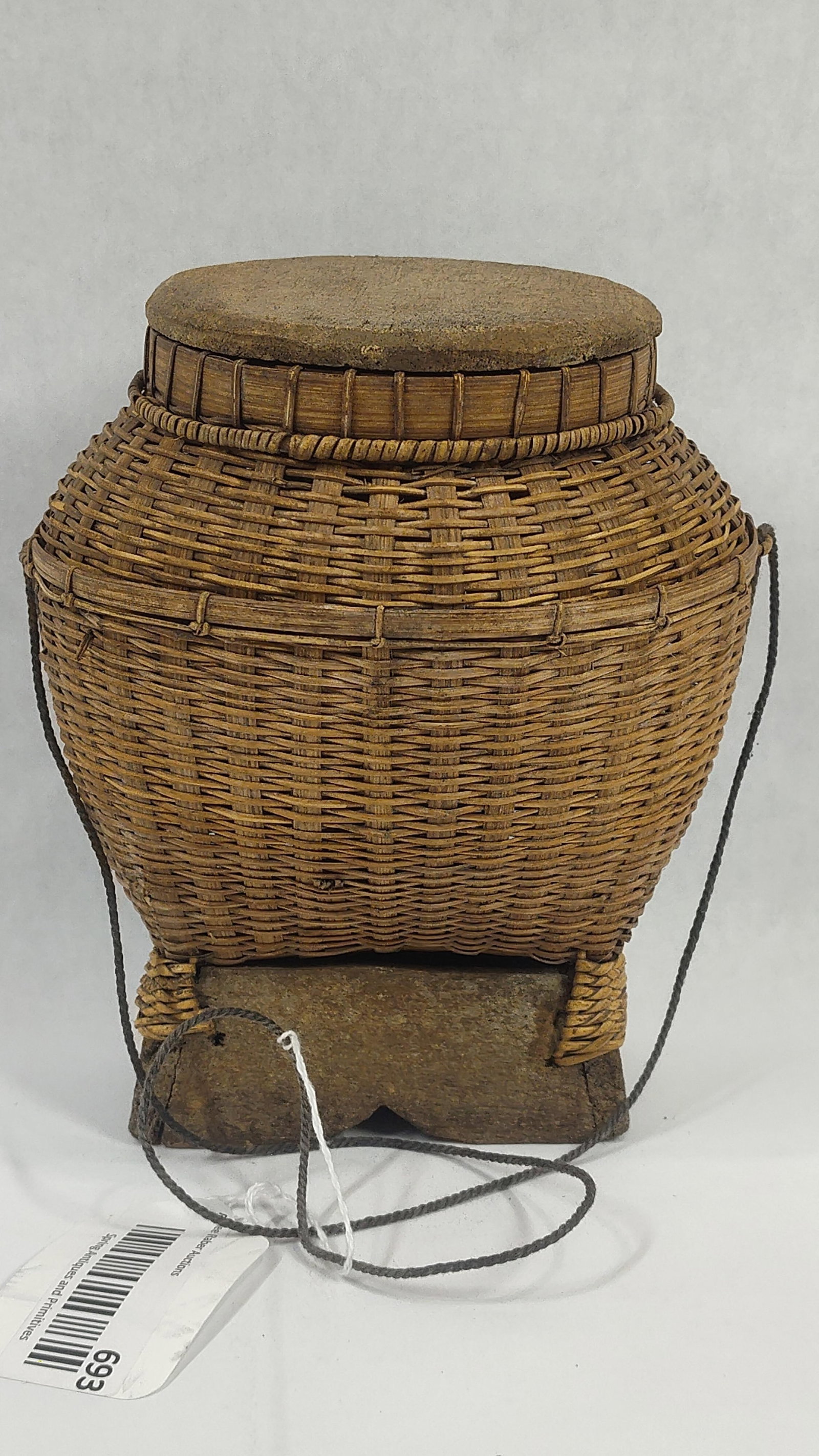 Bamboo Oriental Fish Basket: Woven with a wooden base, fitting wood lid, and a dainty braided handle. 7.5x6.5x4