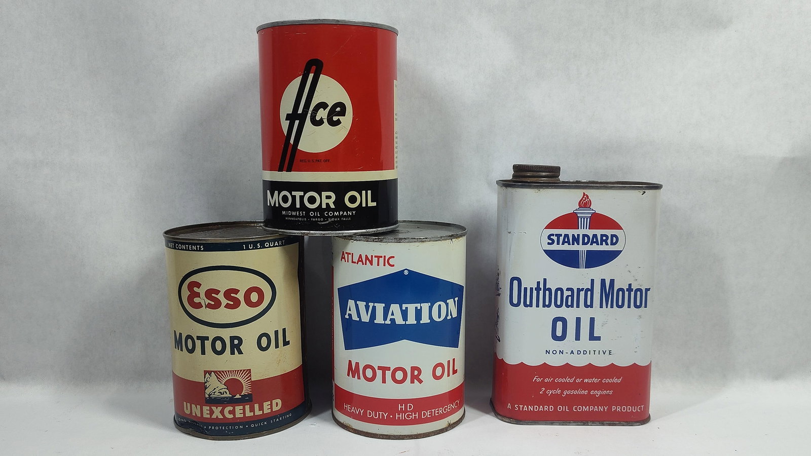4-Various 1qt Motor Oil cans: Esso and Atlantic Aviation are unopened, other 2 are empty.