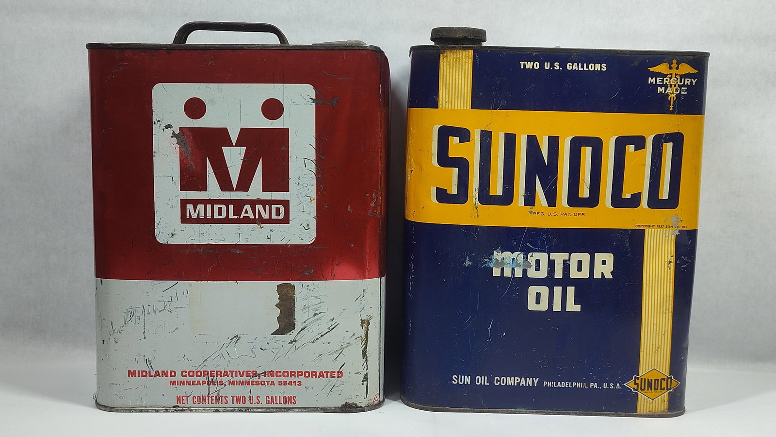 Sunoco & Midland 2gal cans: Both are empty.