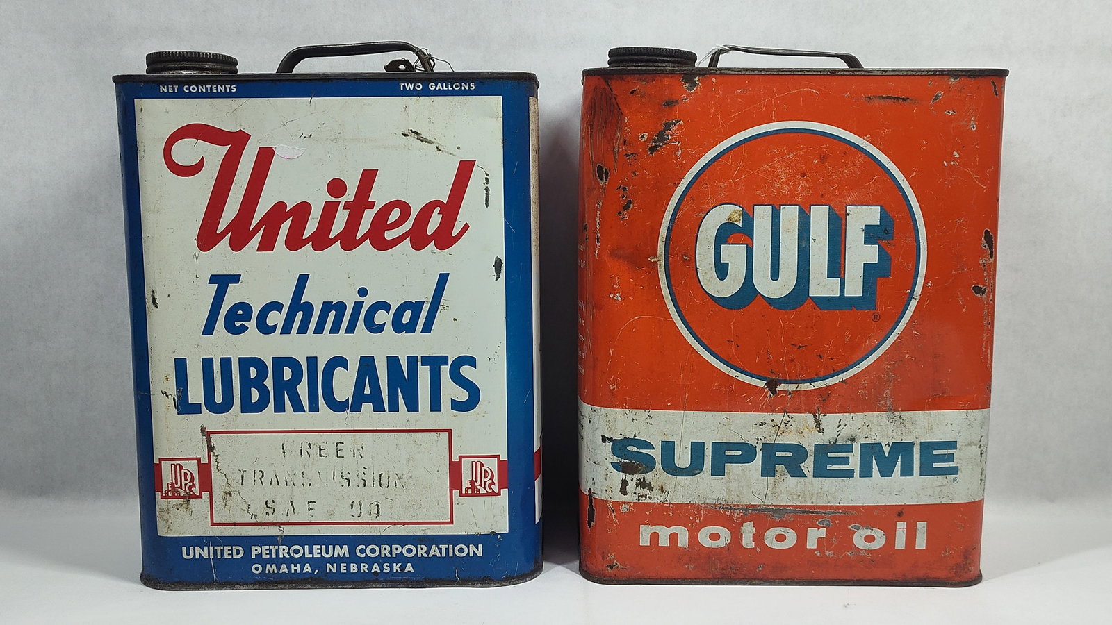 Gulf & United 2gal cans: Both are empty.
