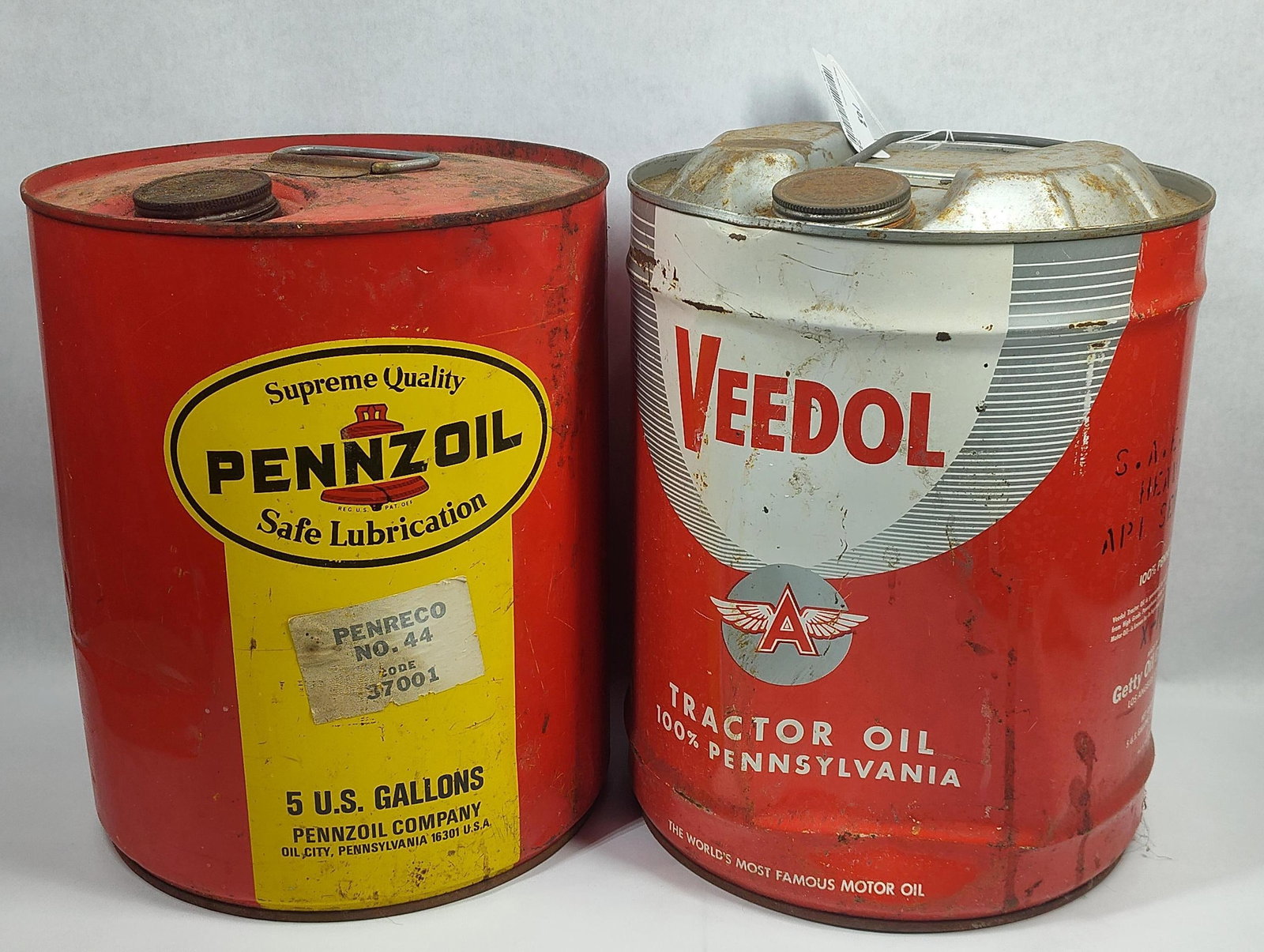 Veedol & Pennzoil 5gal cans: Both have dents.