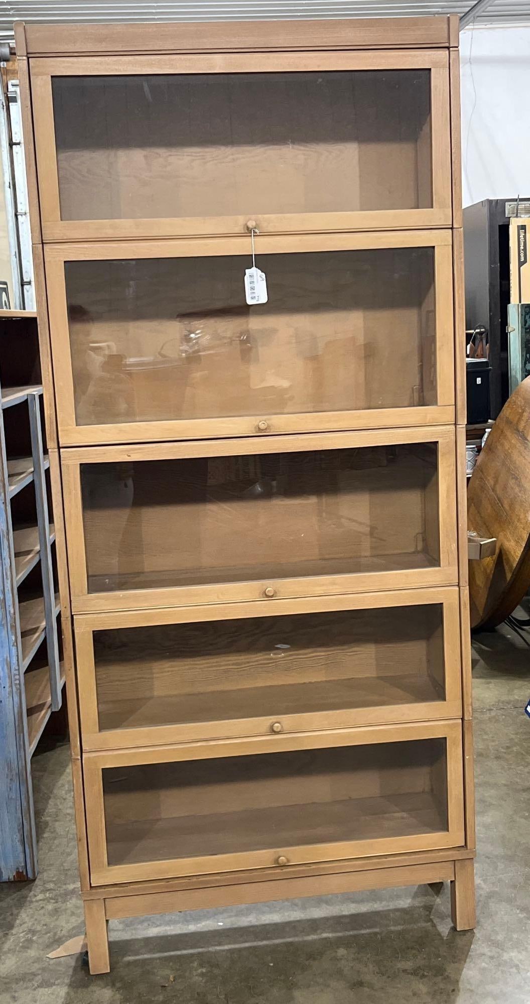 5 Stack Lawyers Bookcase: Lift front doors. Each section is 34x15.5. Entire height is 75.5 inches 