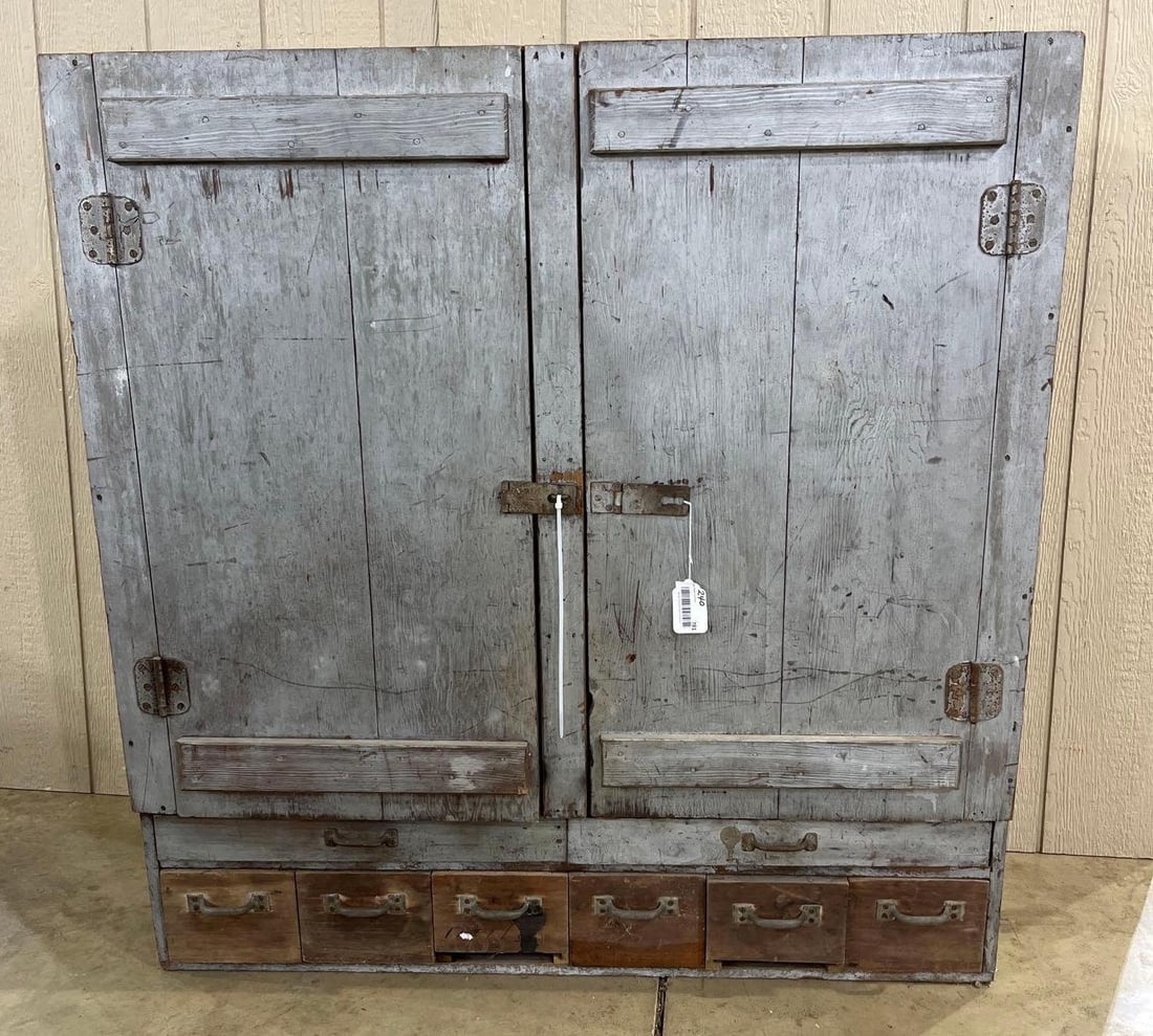 Unique 8 Drawer/ Two Door Cabinet: A primitive gray finish with 6 small drawers and two thin. Two upper door reveal shelves on the interior. 46x47.5x12