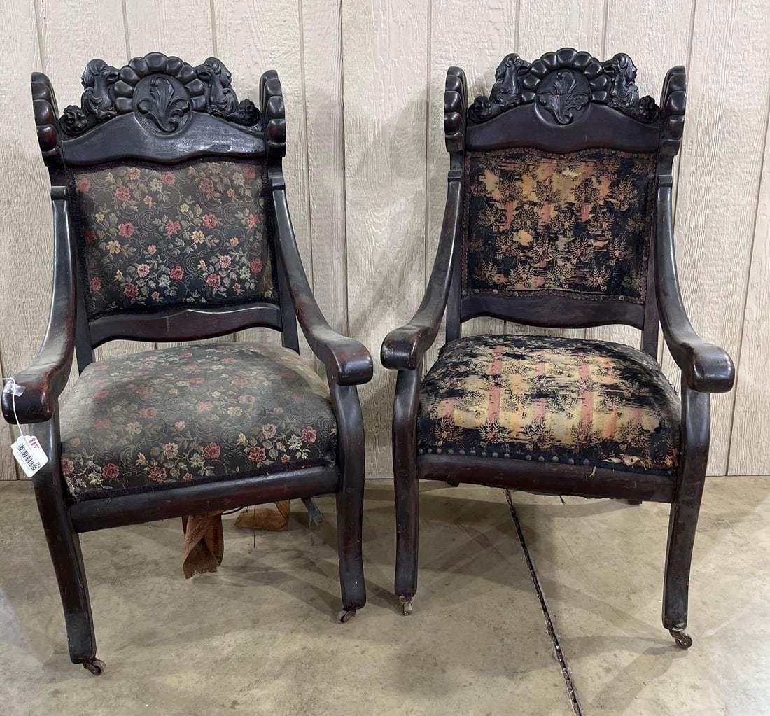 Pair of Walnut Phoenix Carved European Throne Style Chairs: Each chair shows a different upholstery but bodies are matching. One has a repair to the back rest. 42x20x24