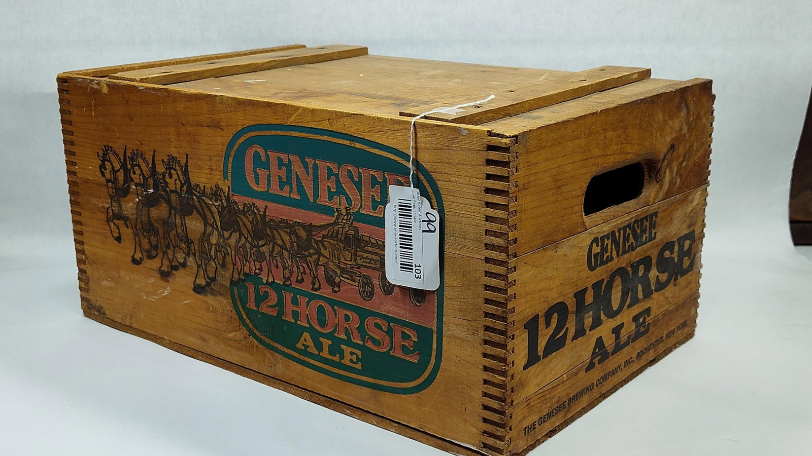 Genesee Brewing Company 12 Horse Ale Crate with Lid: Thisshipping crate was produced for the Genesee Brewing Company, Inc. of Rochester, New York, to transport 12 Horse Ale. The rectangular container is constructed from wood with durable finger-jointed