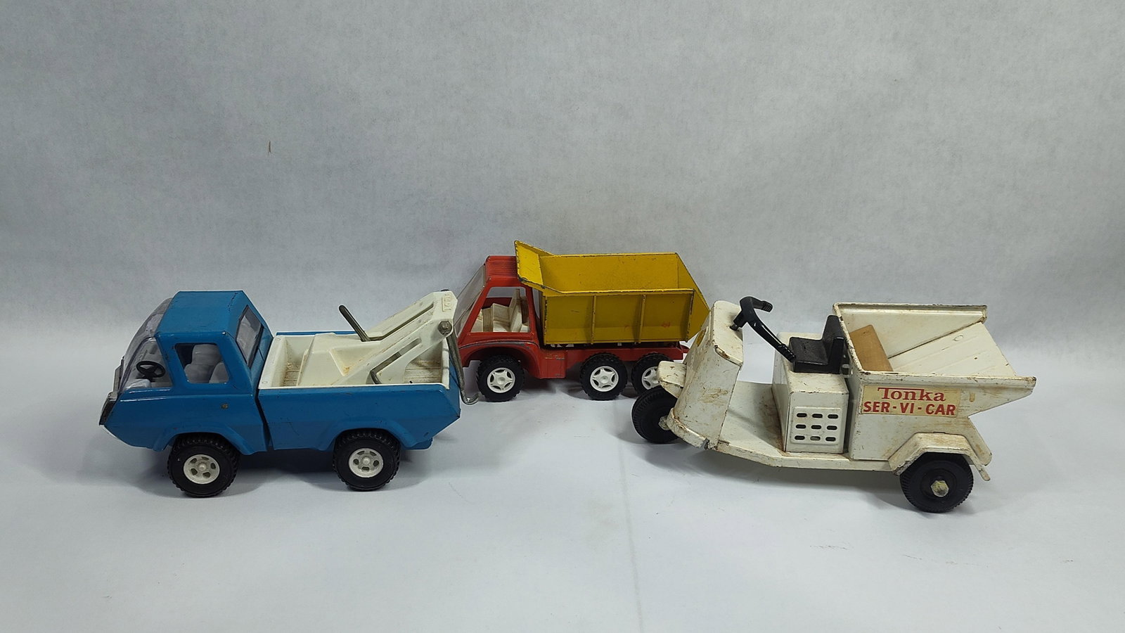 ThreeTonka and Hubley Toy Vehicles Including a Tow Truck, Dump Truck, and Ser-Vi-Car (1 of 8)