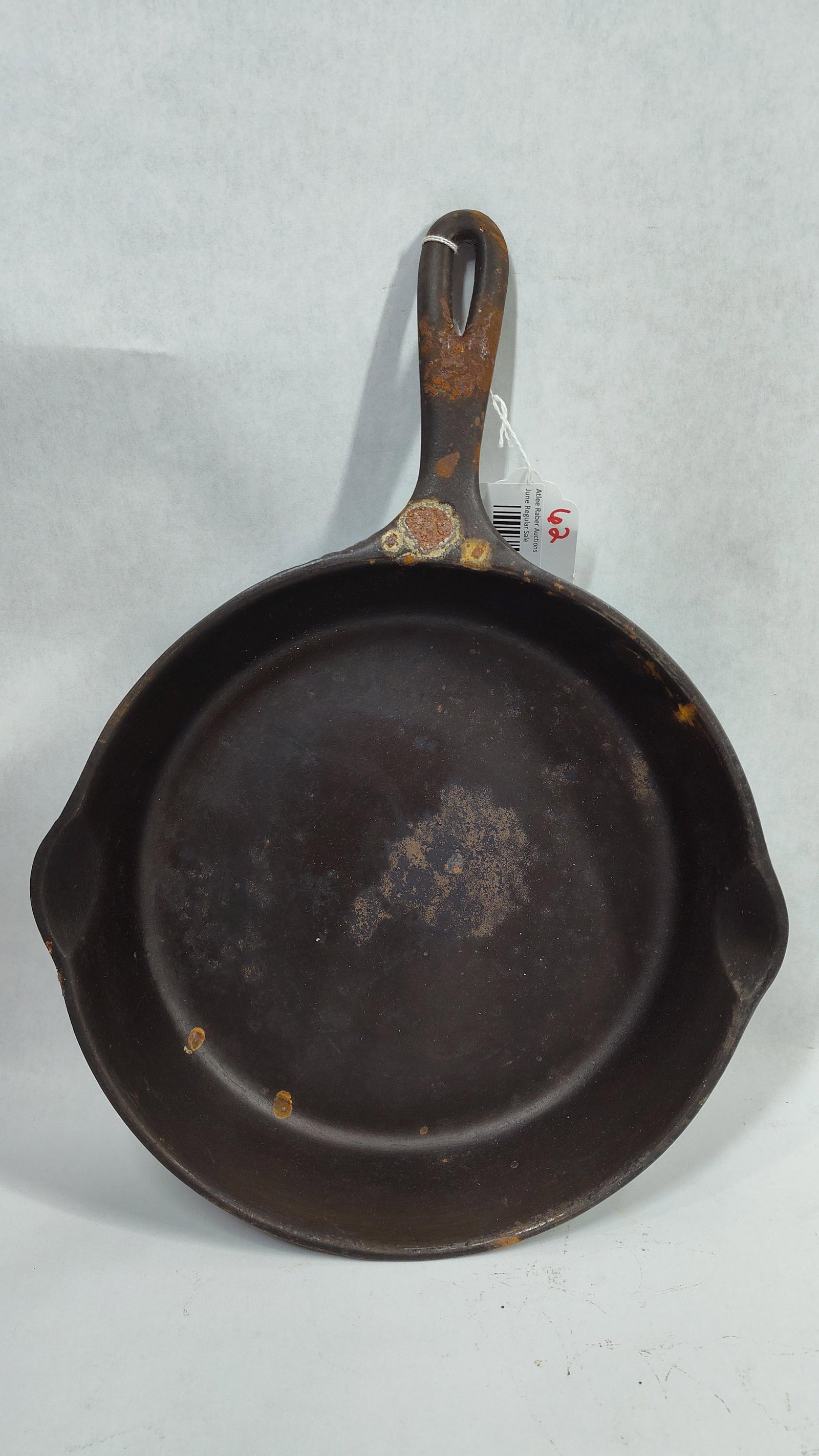 Wagner Ware Sidney -O- Cast Iron Skillet Number 8 Model 1058 C: This cast iron skillet was manufactured by the Wagner Manufacturing Company of Sidney, Ohio. The base of the pan features the company's stylized logo with the words WAGNER WARE over SIDNEY -O- incised