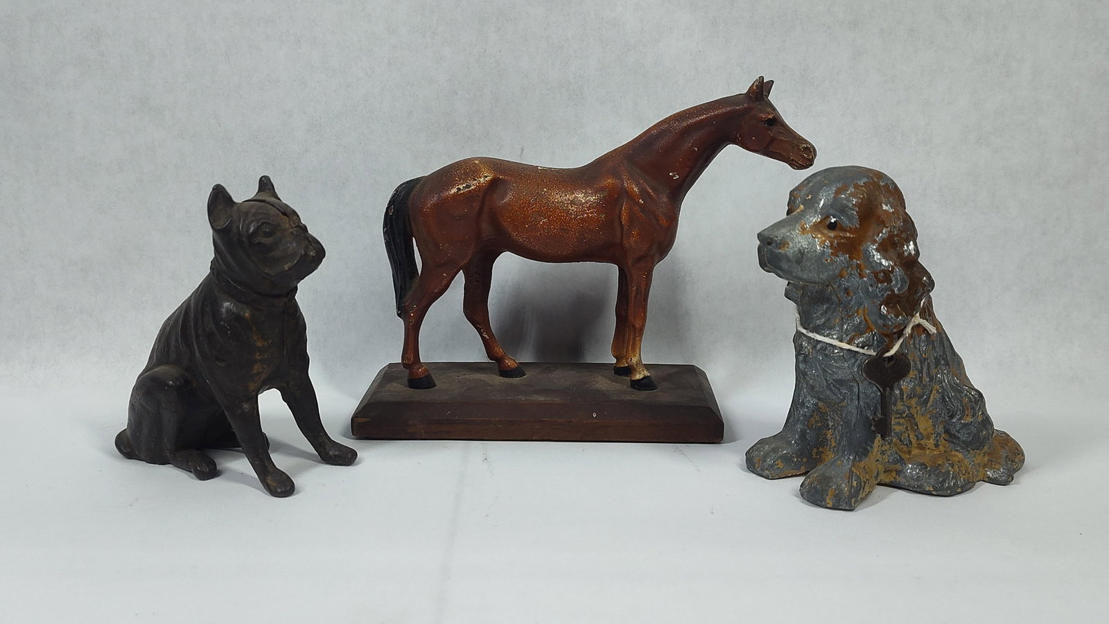ThreeAnimal Subject Collectibles Including Two Figural Still Banks and a Horse Figurine (1 of 6)