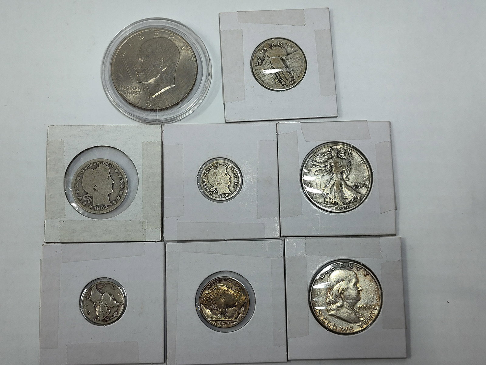 US Silver and Base Metal Coins, 1903-1971: United States coinage comprising silver and base metal denominations. The grouping includes a 1971 Eisenhower dollar, a 1939 Walking Liberty half dollar, a 1950-D Franklin half dollar, a 1903 Barber q