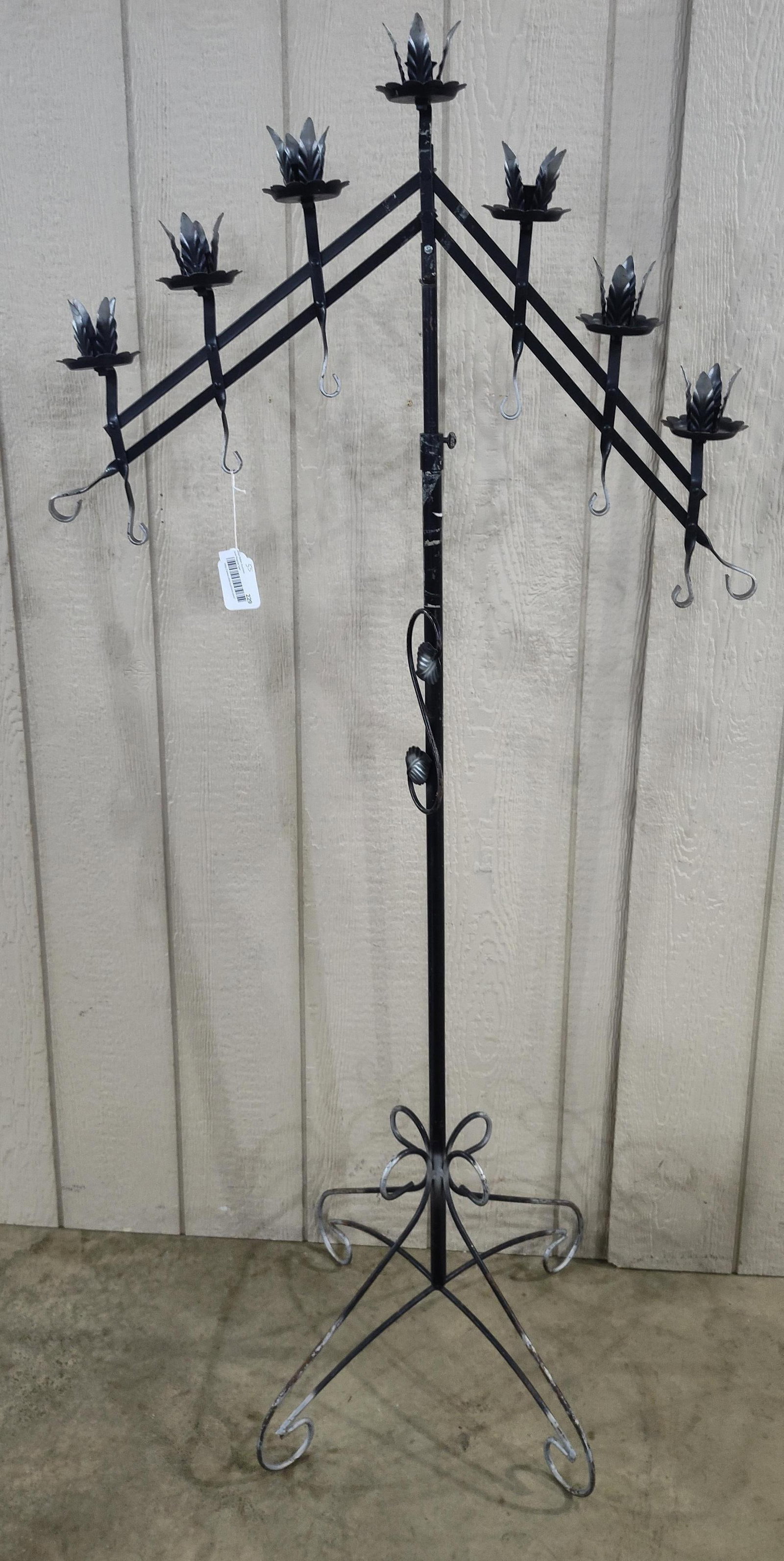 Seven-Light Wrought Iron Gothic Style Adjustable Floor Standing Candelabra: A floor-standing seven-light candelabra in the Gothic style, constructed from wrought iron with a black painted finish and silver-toned dry-brushed highlights. The upper assembly features seven candle