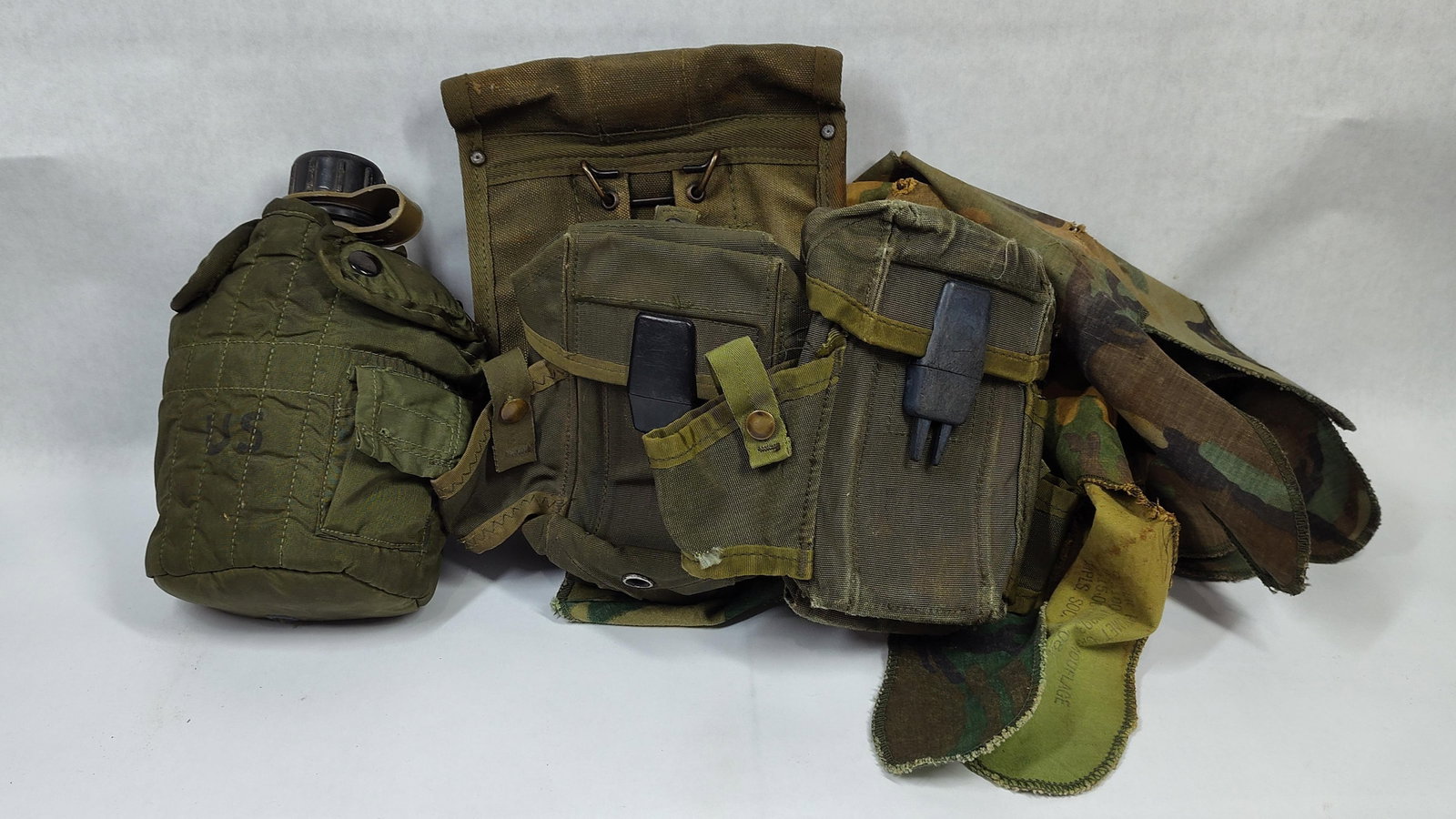A Group of US Military Vietnam War Era M-1967 and M-1956 Field Equipment and Mitchell Pattern Helmet (1 of 6)