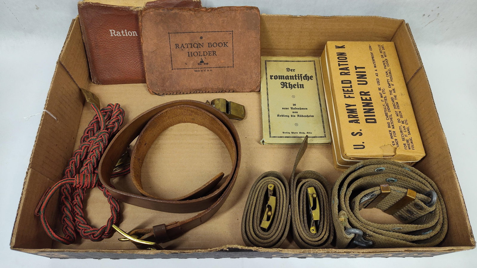 An Assortment of WWII United States Military Field Equipment, Home Front Ephemera, and a European (1 of 8)