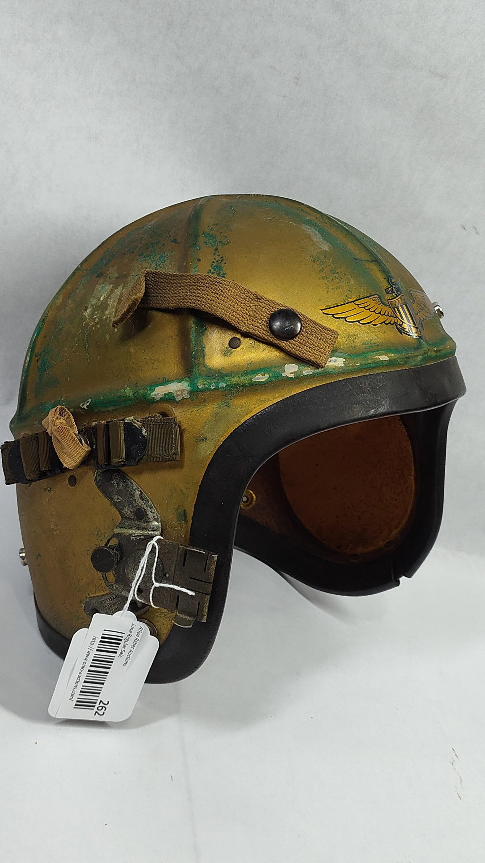 1950s US Navy Type H-4 Flying Protective Helmet: This is a United States Navy Type H-4 flying protective helmet, likely manufactured by Bassons Industries Corporation based on the partial interior label. This model was a standard flight helmet for U