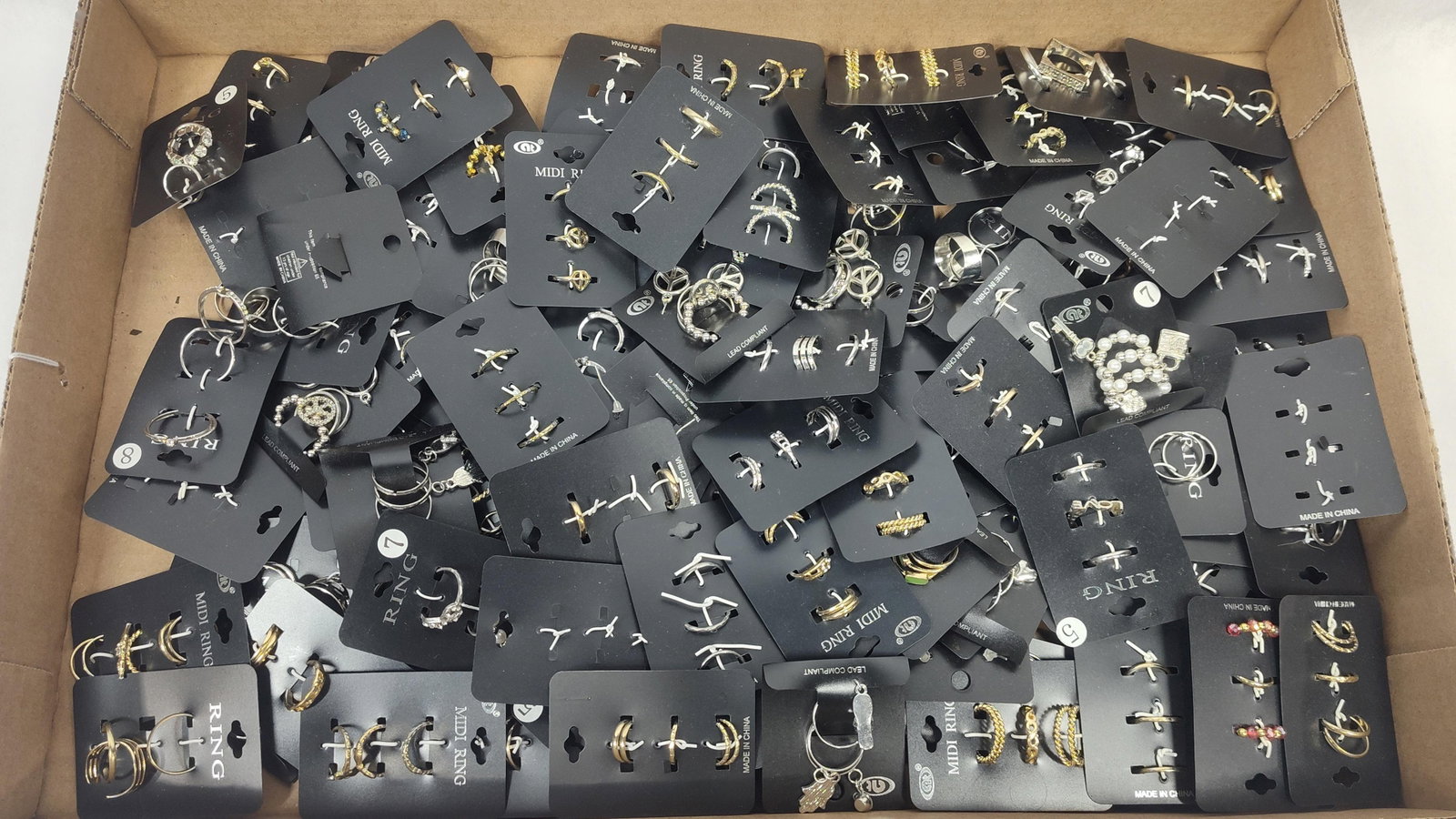 An Assortment of Contemporary Retail Fashion and Midi Rings (1 of 4)