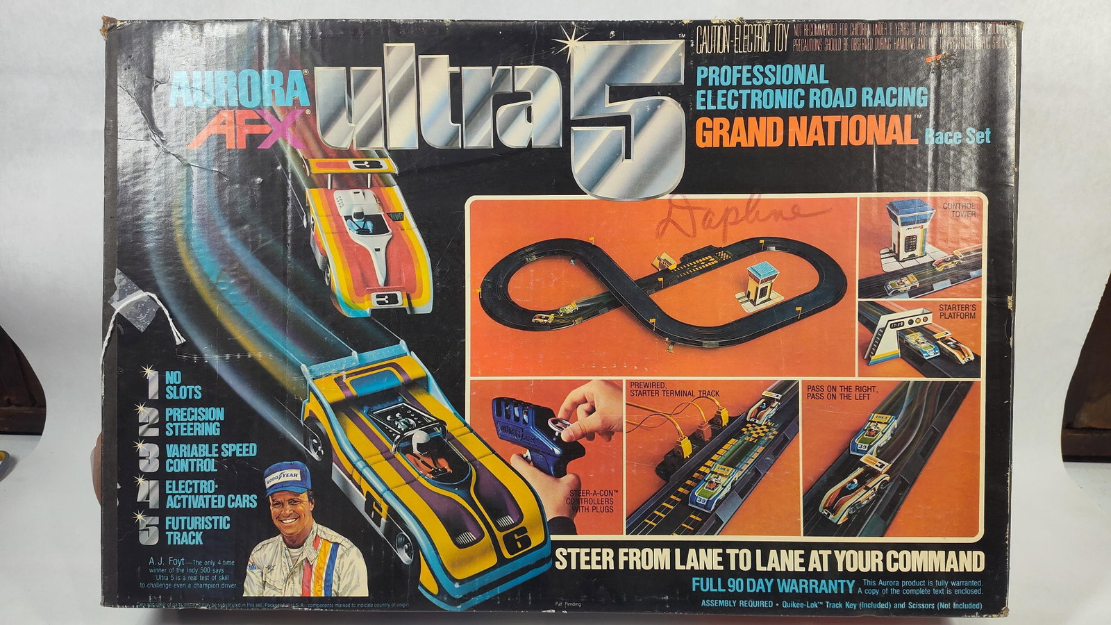 Aurora AFX Ultra 5 Grand National Professional Electronic Road Racing Set: ThisAurora AFX Ultra 5 Grand National Professional Electronic Road Racing Set, manufactured circa 1978, features slotless racing technology designed to allow lane changing. The set is constructed from